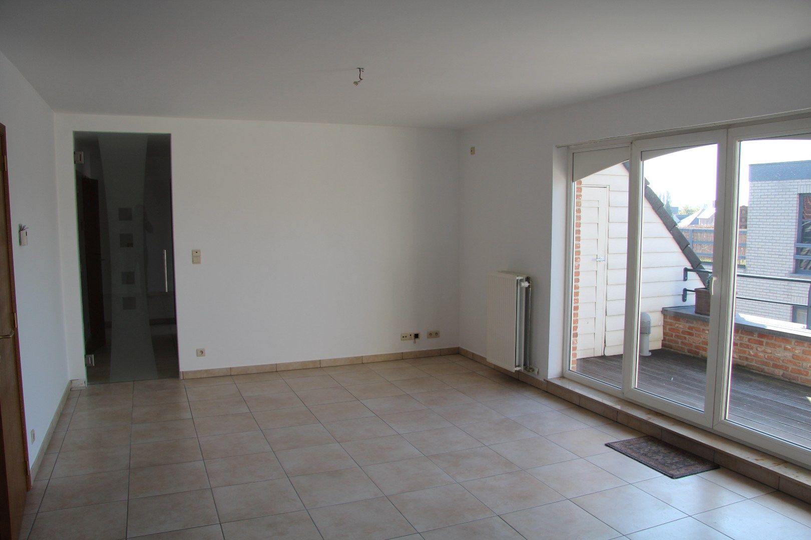 Ruim dakappartement met 2 slk, terras en garage foto 2