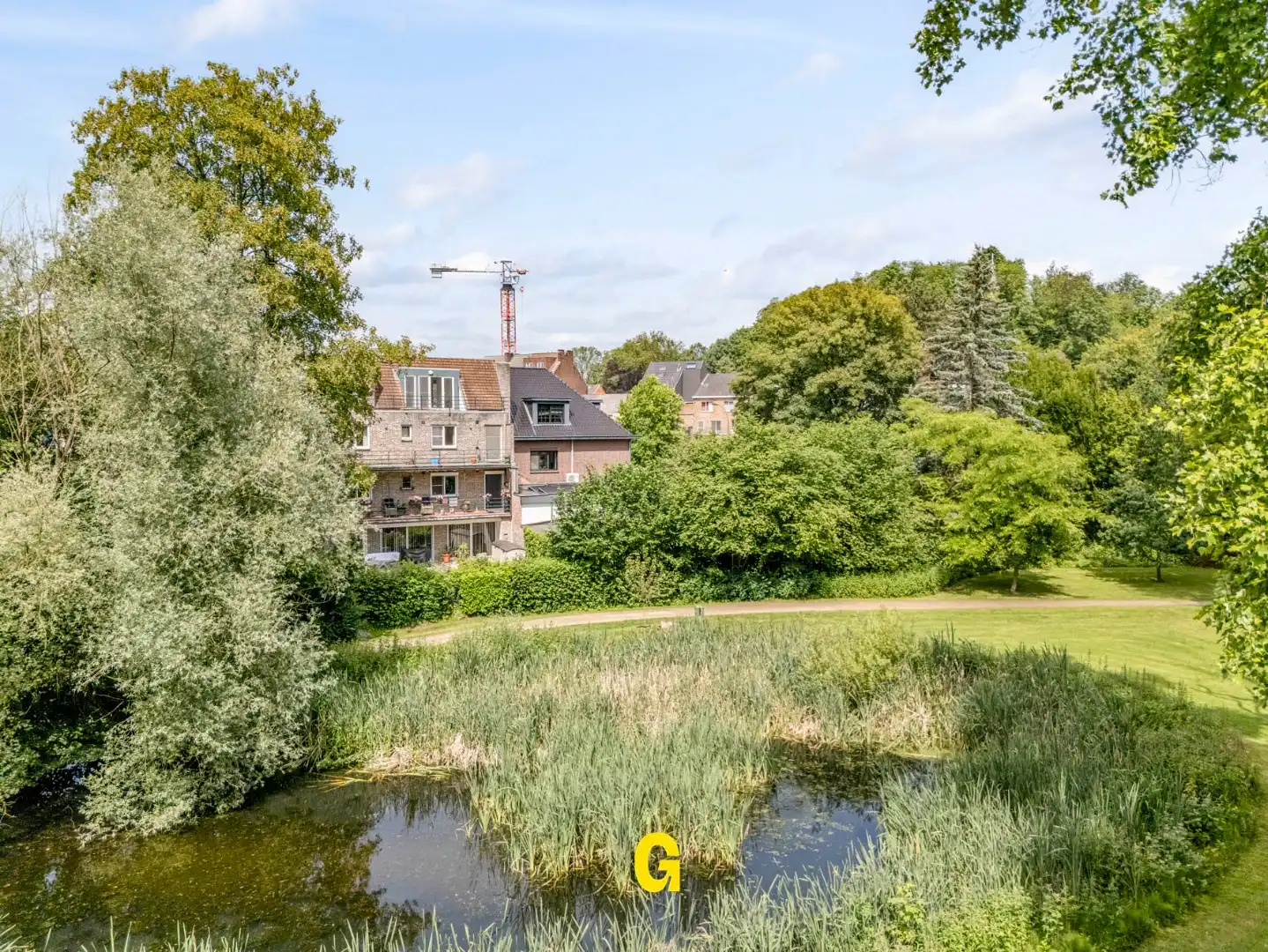 Uitstekend verzorgd 2-slaapkamer appartement in hartje Bilzen, met standplaats, kelderberging en terras met zicht op het Park van Haffmans foto 27