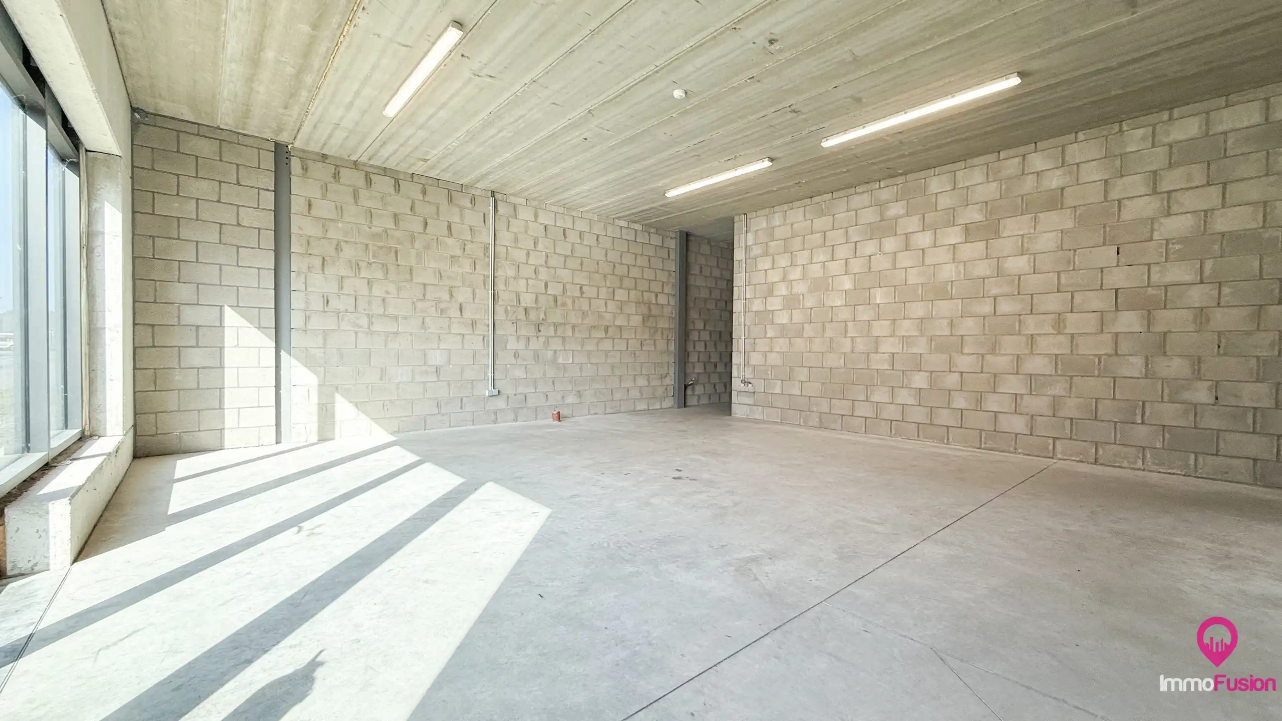 Recente, instapklare magazijnruimte van 440 m² te Houthalen! foto 13