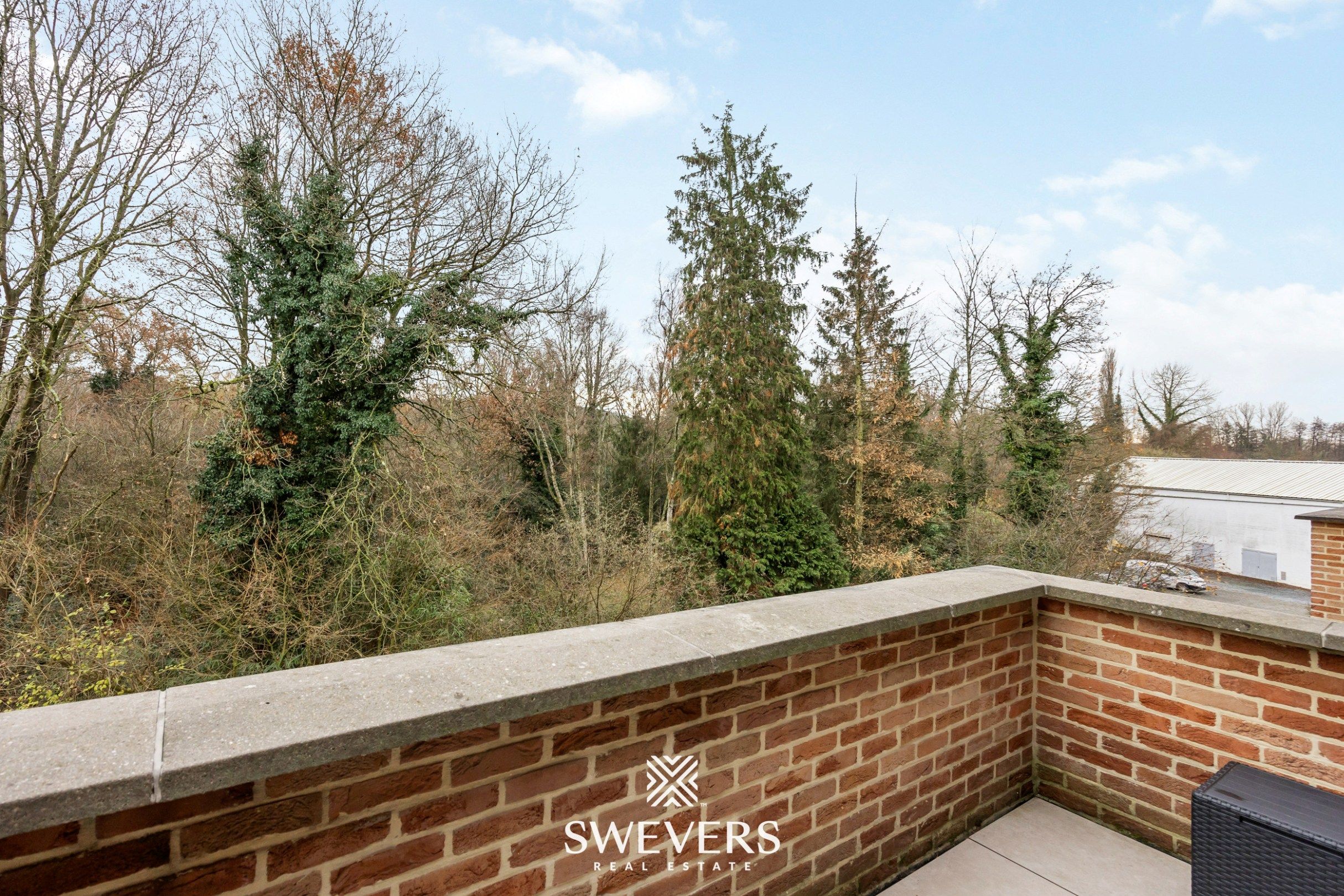 Hoogwaardig duplexappartement met zonnig terras op de bruisende Vennestraat in Genk  foto 18