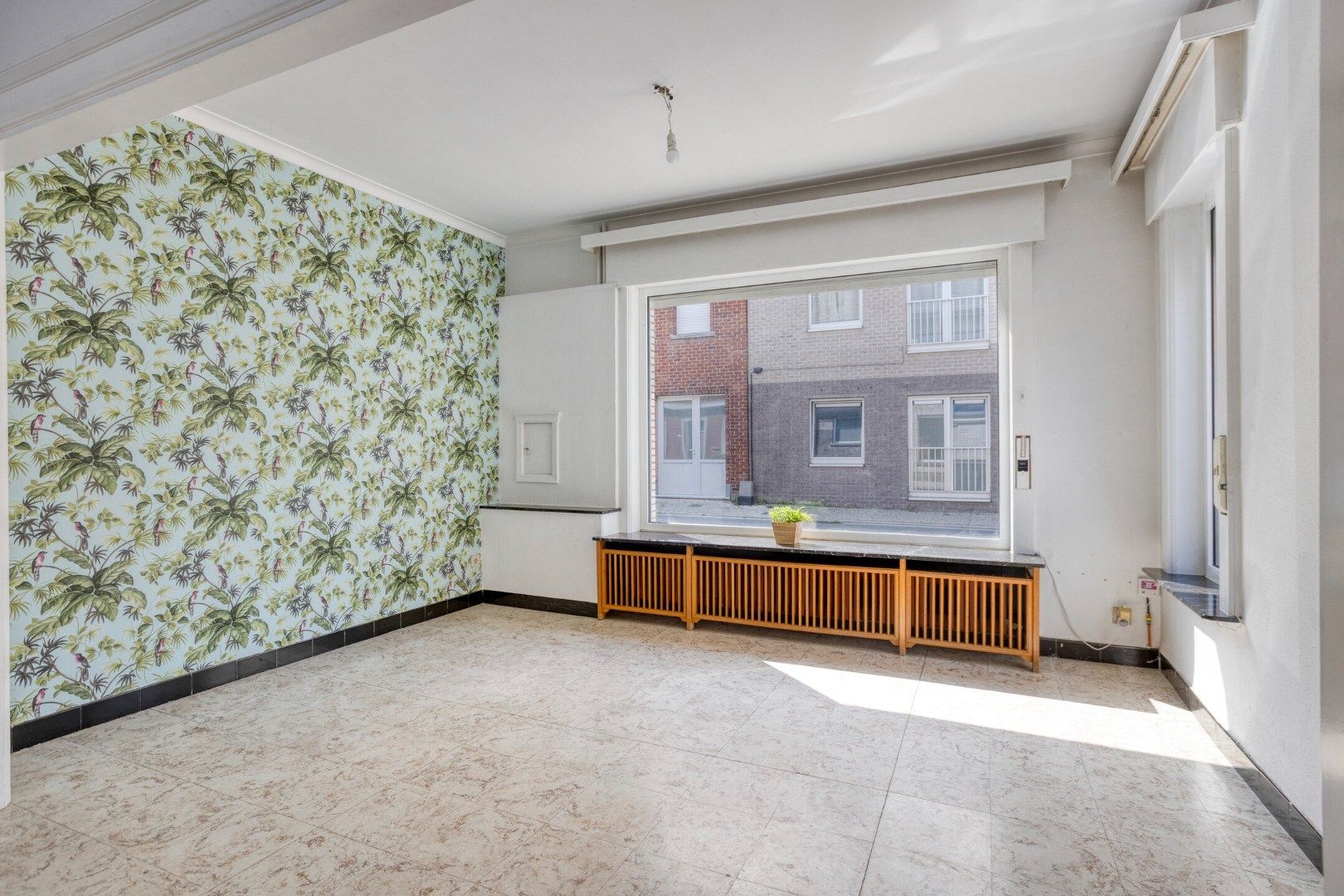 Leuke, halfopen woning met 3 slaapkamers, garage en tuin! foto 4