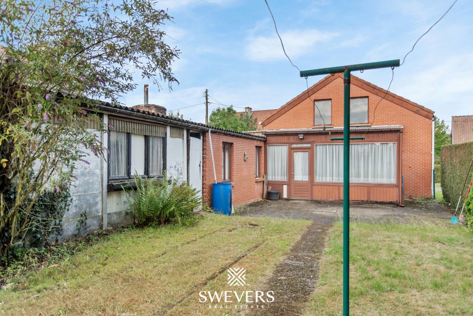 Te renoveren woning met veel potentieel op toplocatie te Diepenbeek foto 29