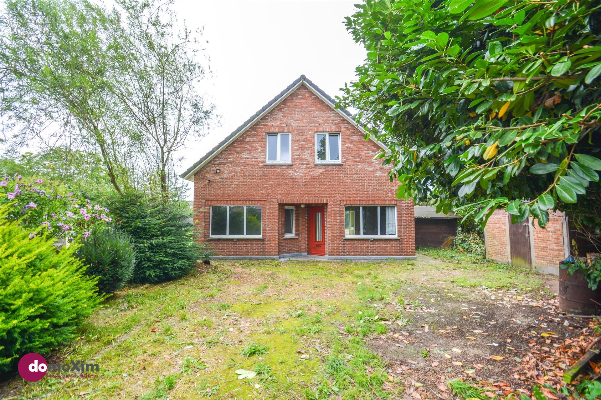 Centraal gelegen jaren '50 woning met leuke tuin in Boortmeerbeek  foto 1