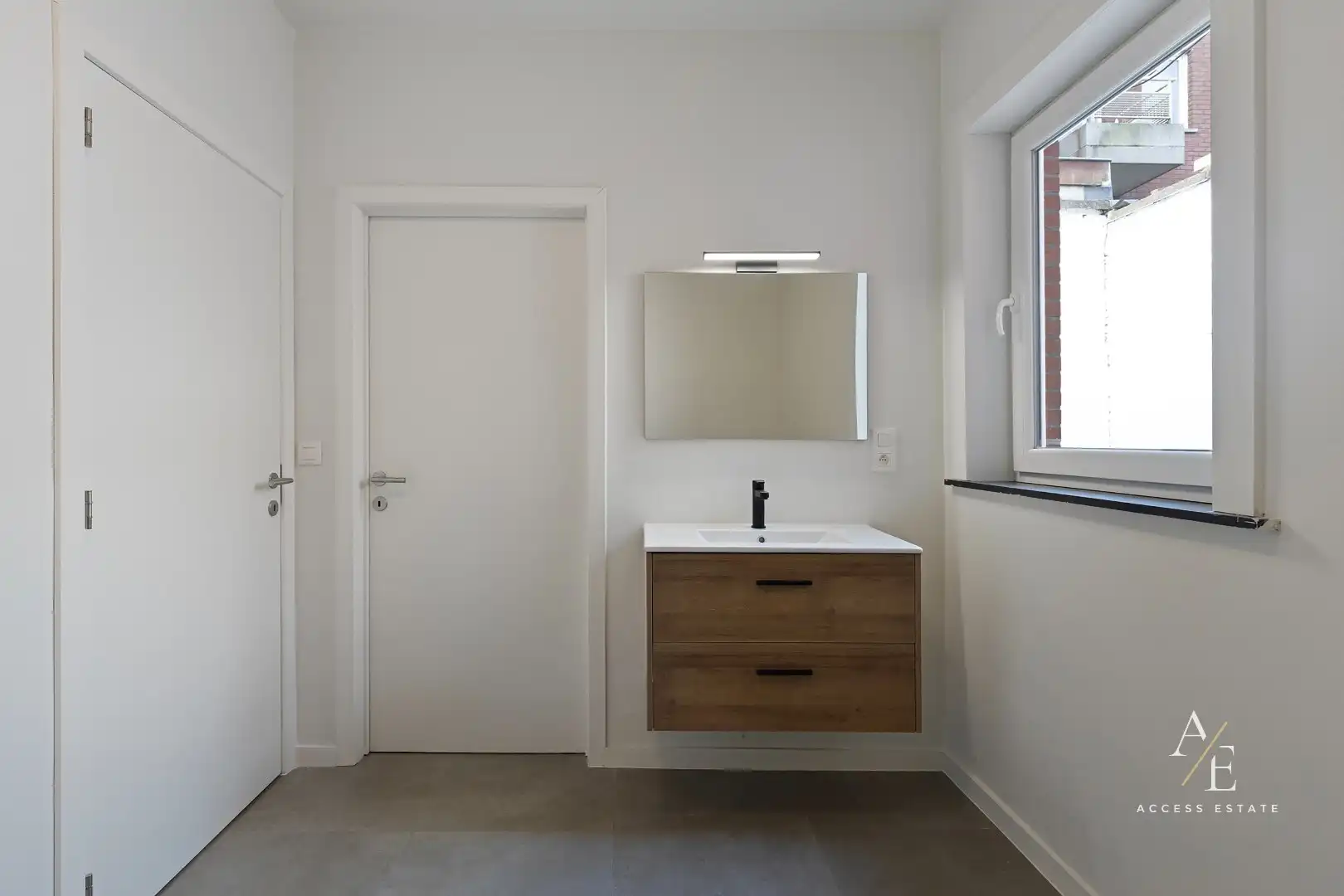 WETTEREN-Instapklaar appartement met terrassen/carport! foto 5