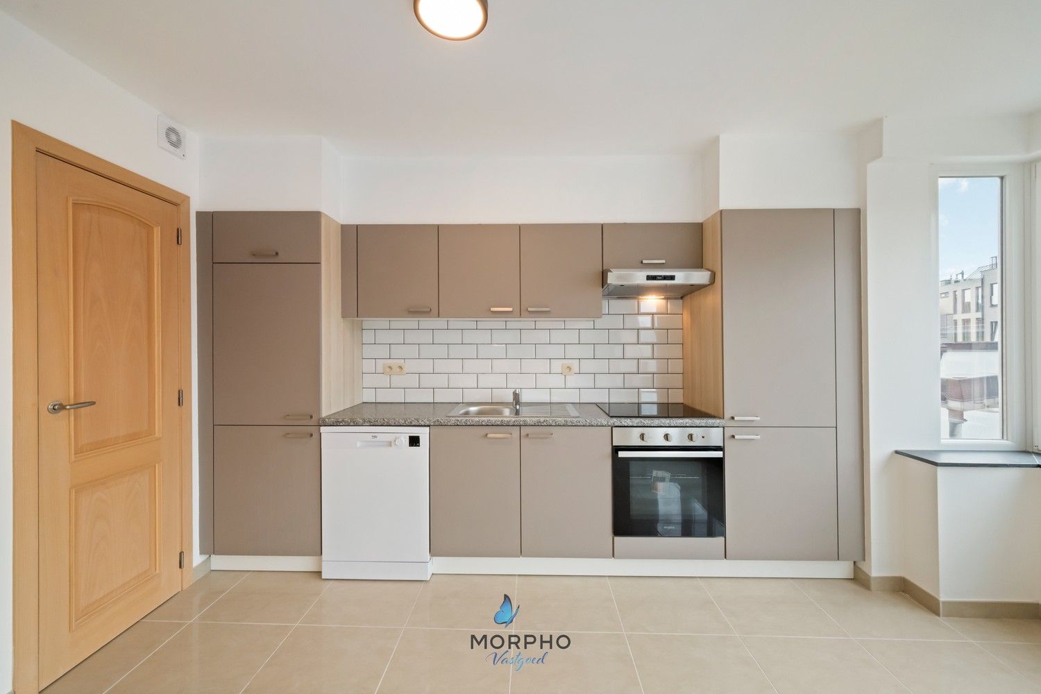 Modern en energiezuinig 2-slaapkamerappartement op de derde verdieping in hartje Temse! foto 3