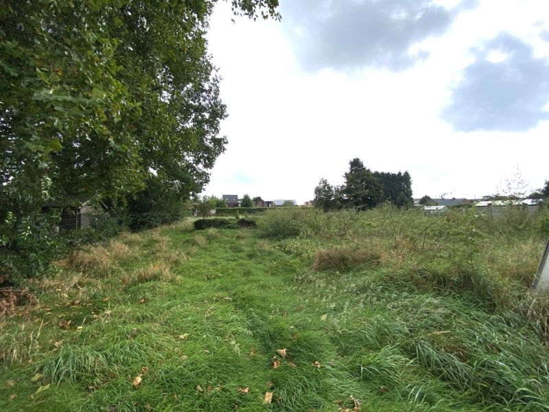 Te renoveren woning nabij centrum Mol, met aanpalende grond van +-21a, gelegen in doodlopende straat foto 8