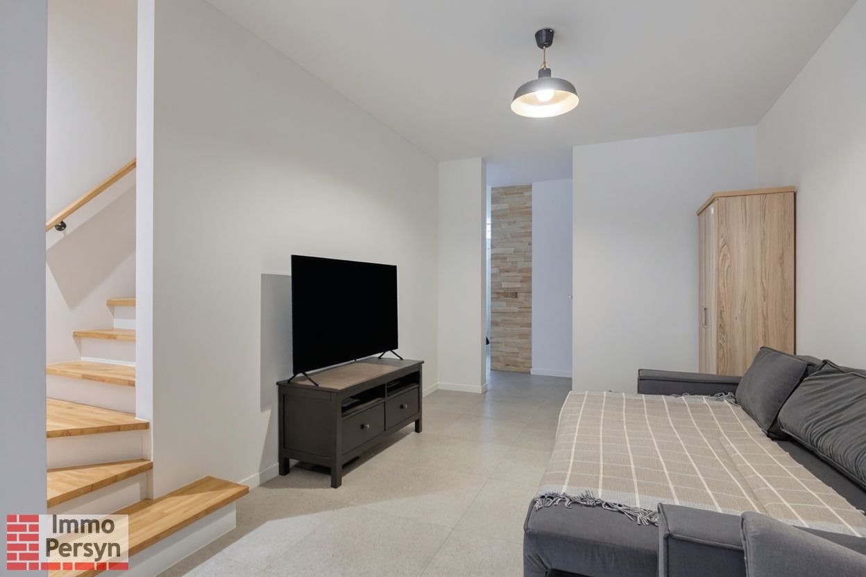 Moderne gezinswoning met 3 slaapkamers en gezellige tuin foto 6