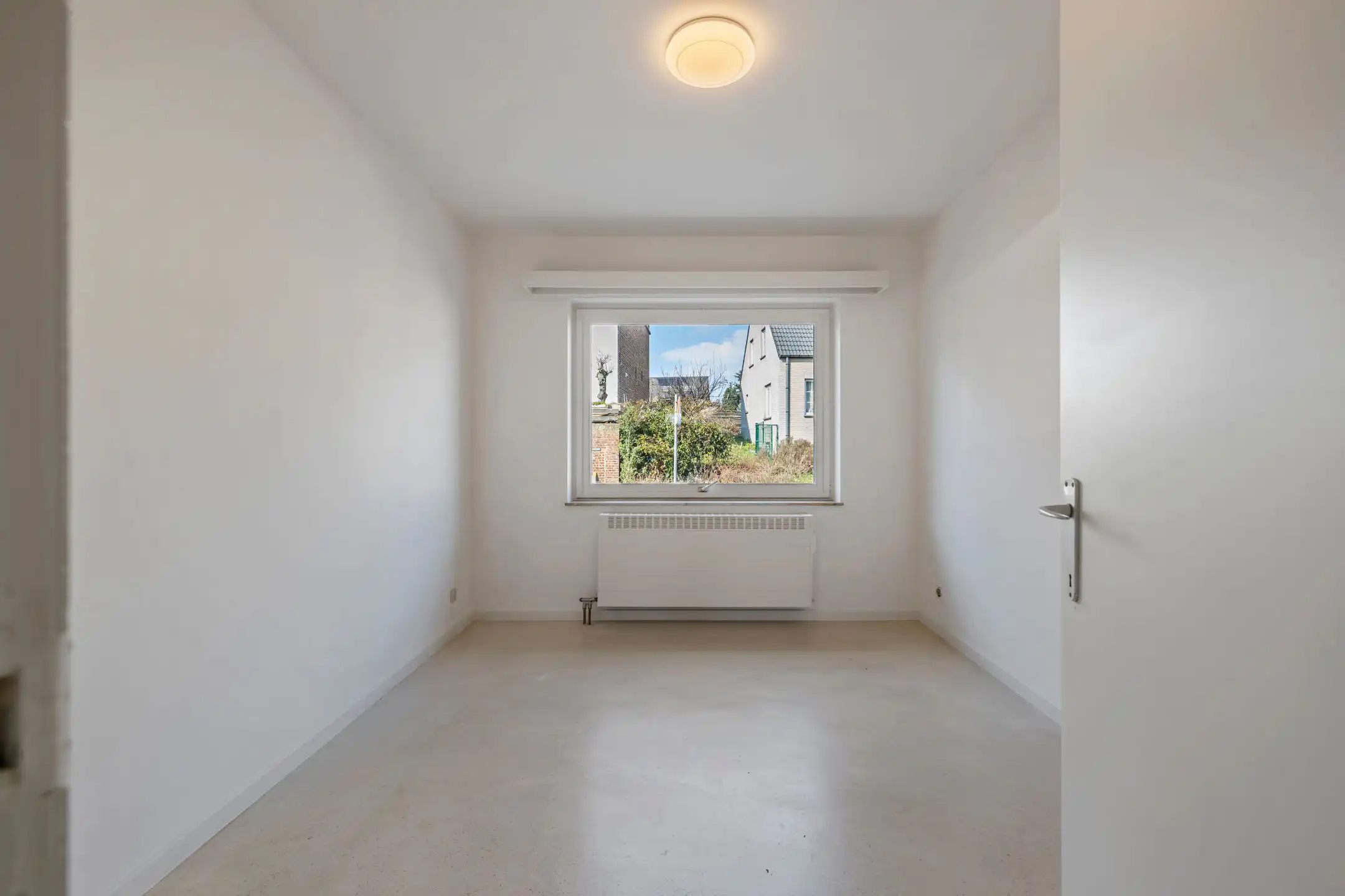 Rustig gelegen gelijkvloersappartement met parkeerplaats foto 12