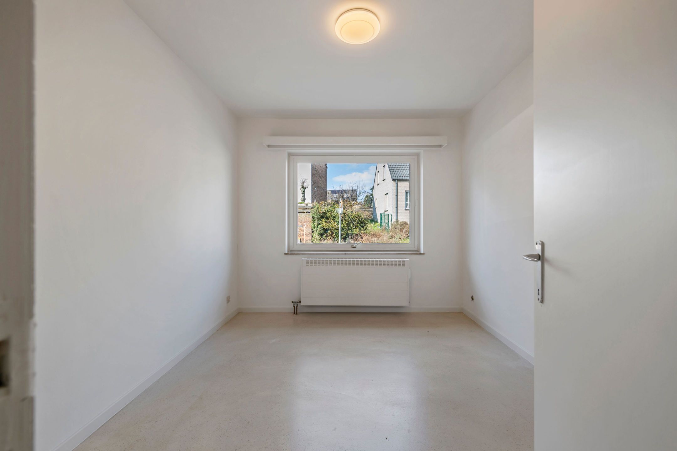 Rustig gelegen gelijkvloersappartement met parkeerplaats foto 12