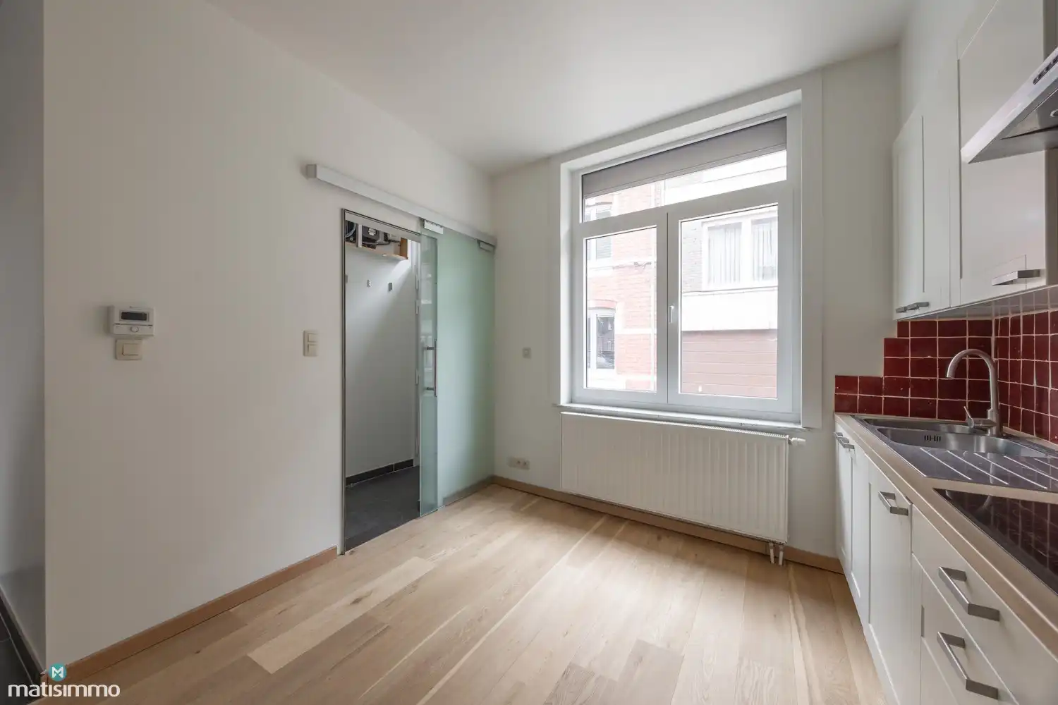 GERENOVEERDE HALFOPEN BEBOUWING MET 2 SLAAPKAMERS OP WANDELAFSTAND VAN HET CENTRUM VAN HASSELT foto 6