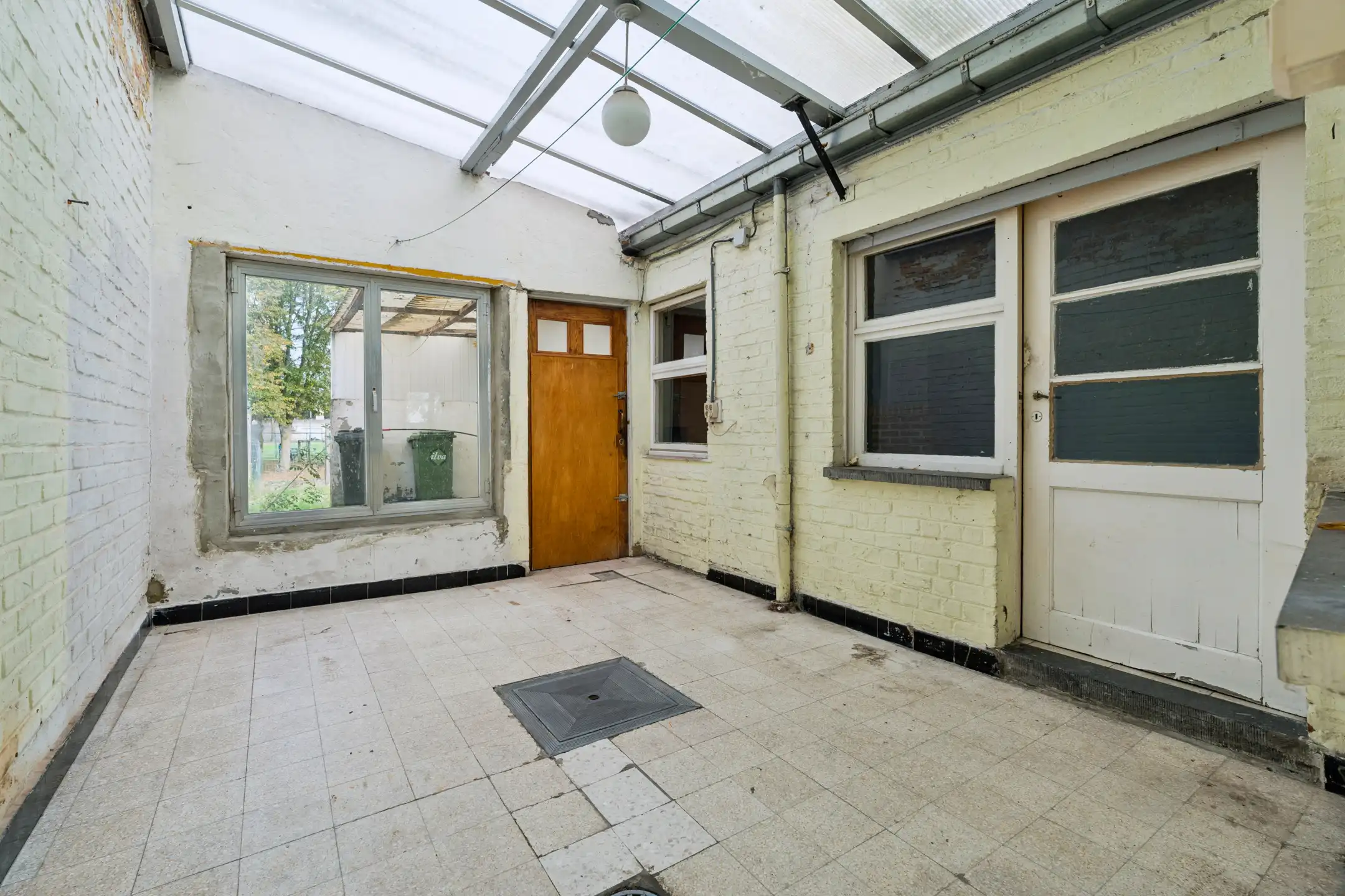 Te renoveren woning met tuin op centrale ligging foto 8