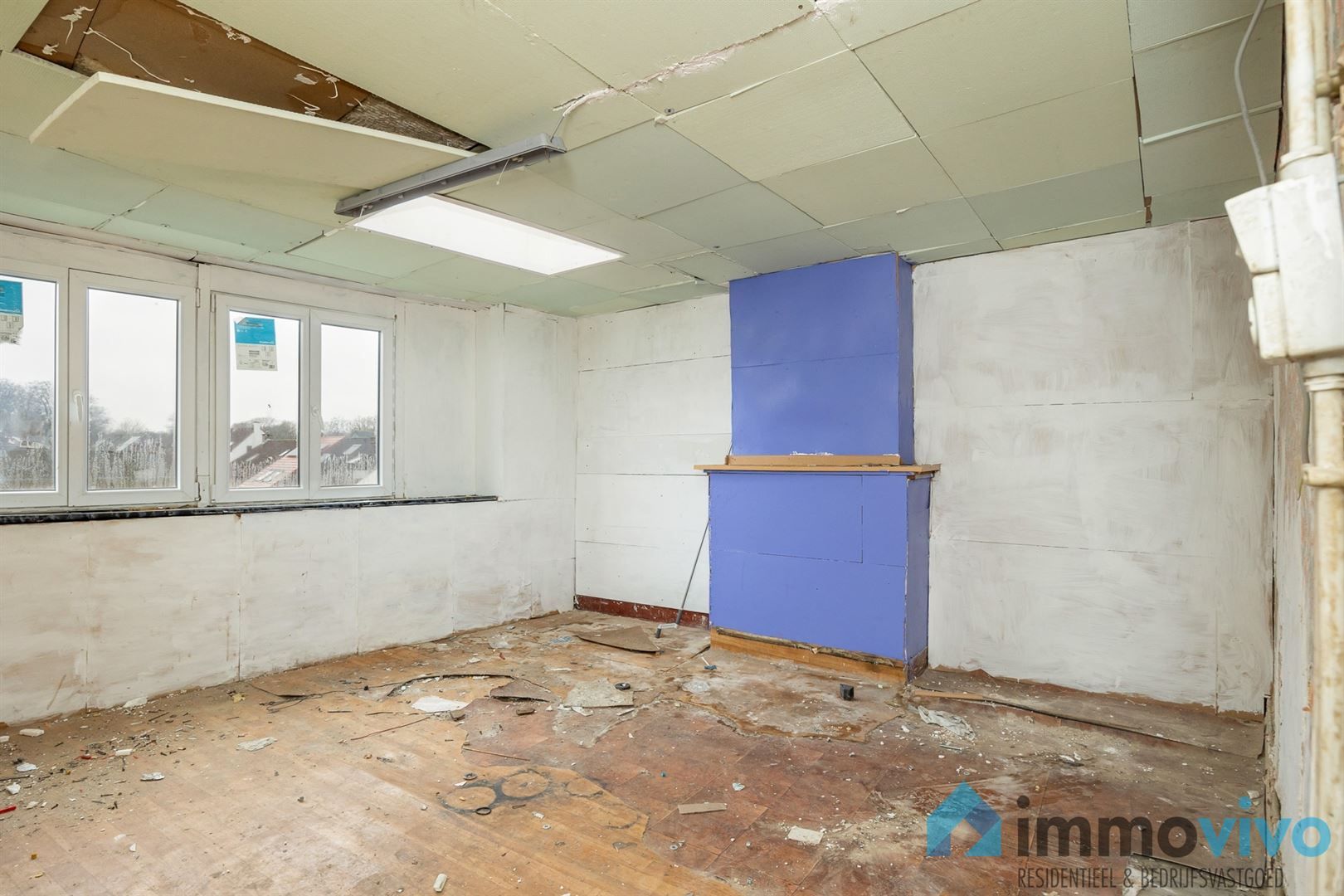 Ruime te renoveren gezinswoning met 4 slpk's en tuin foto 26