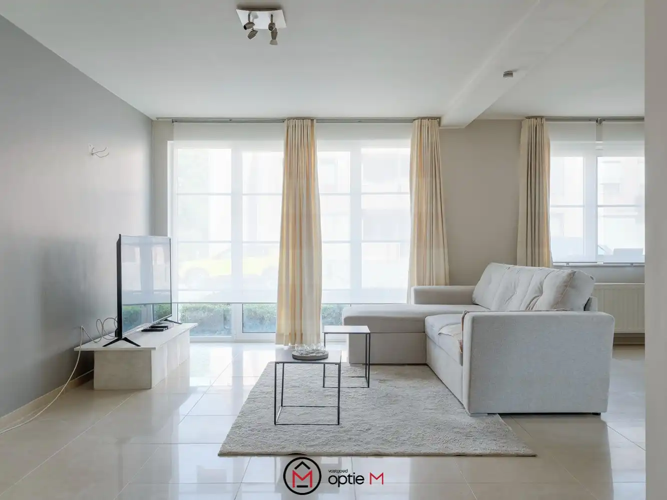 Gelijkvloers appartement te koop in Bilzen – Ruim wonen met terras, carport en kelderberging foto 4