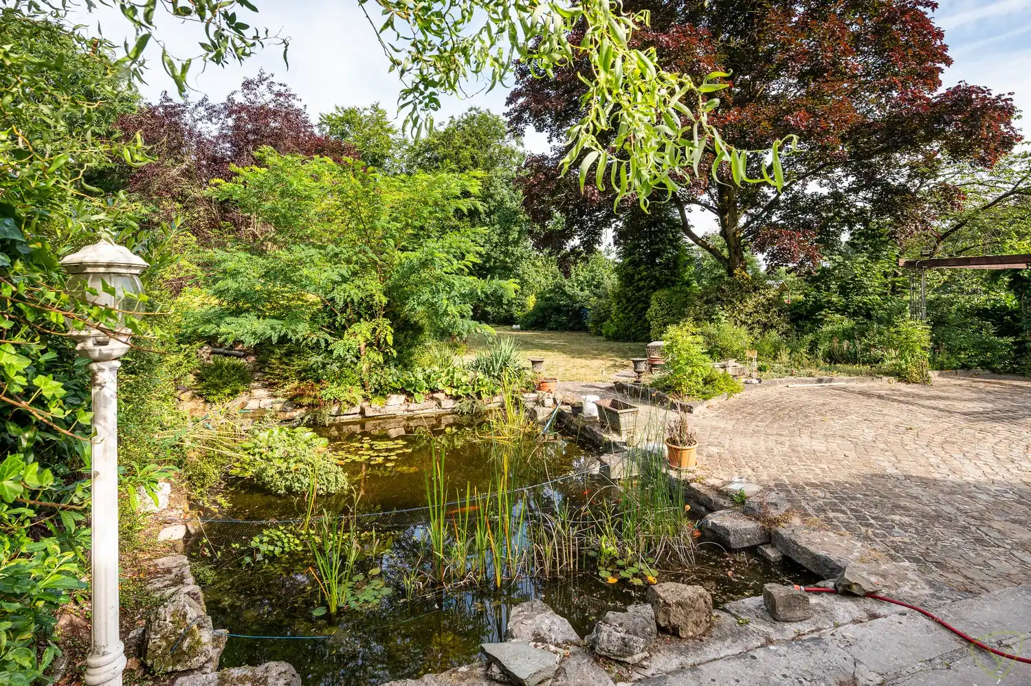 Vrijstaande villa op een uitzonderlijk groot perceel met bosgrond in Lembeke foto 25