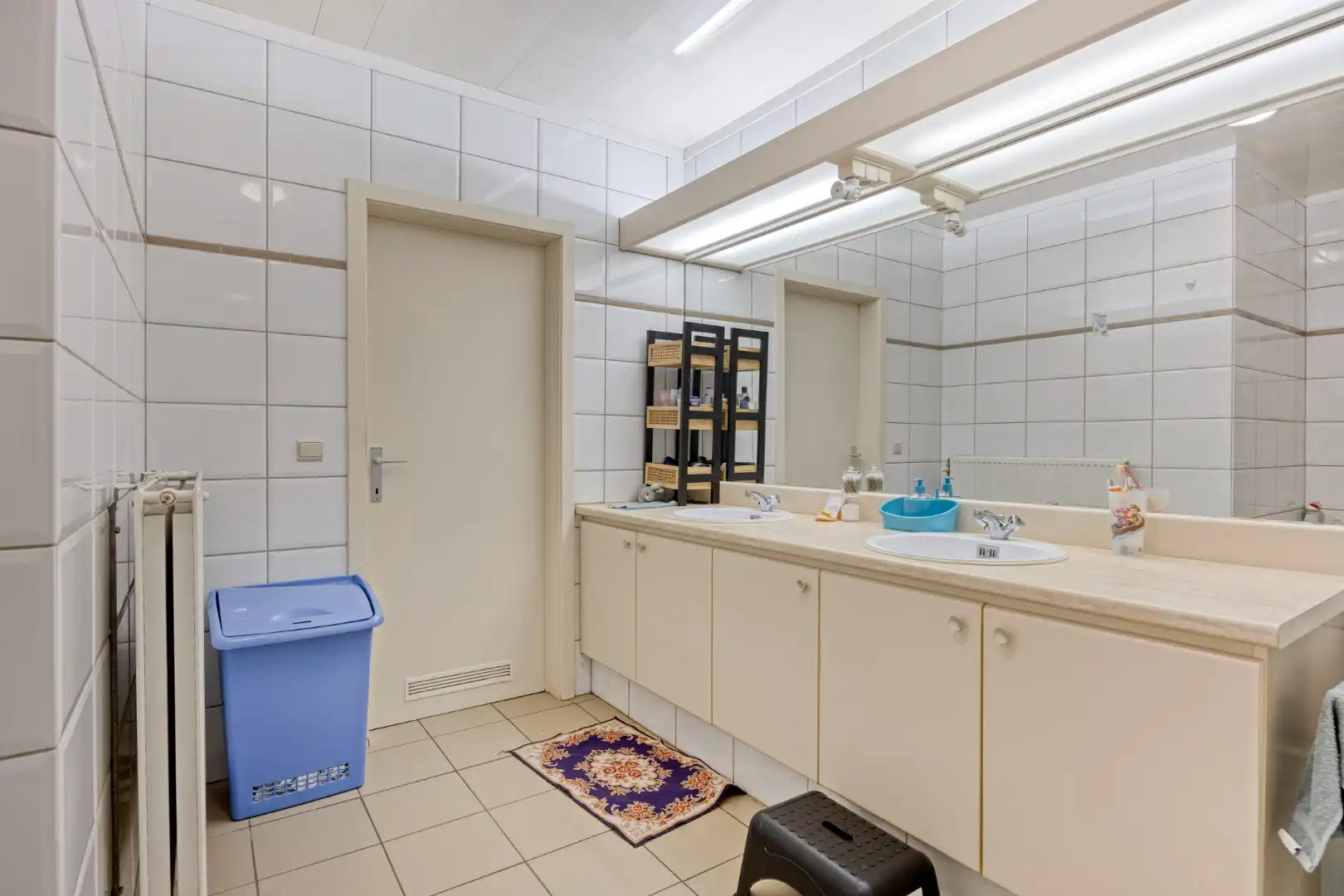 Ruim gelijkvloers appartement met 3 SLPKS, tuin en twee overdekte staanplaatsen !  foto 15