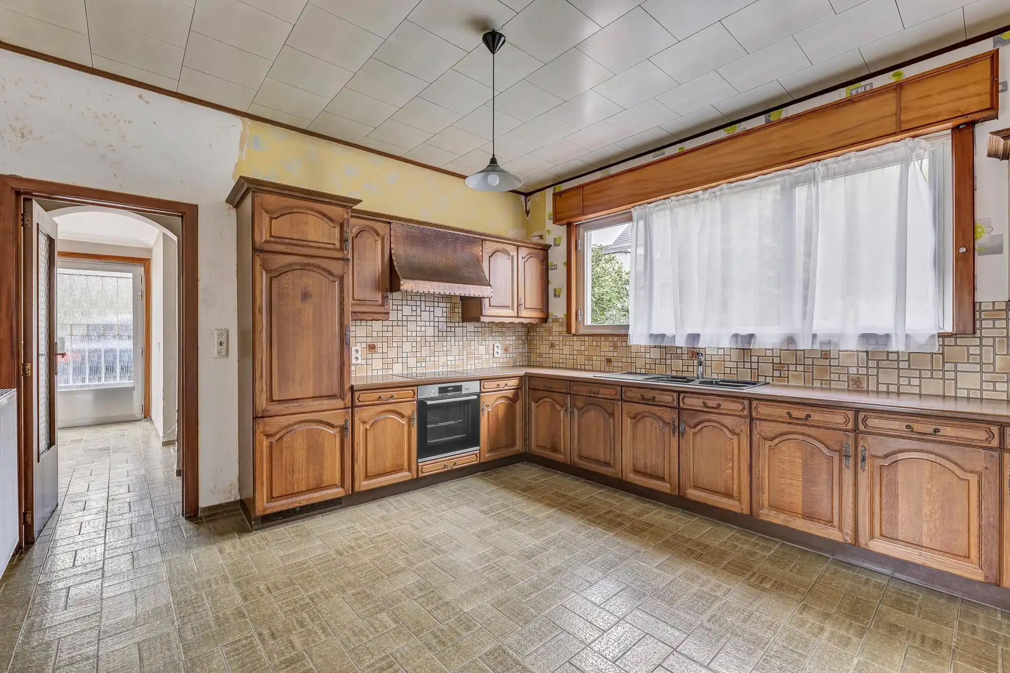 Te renoveren woning op 3a36ca met 3 slaapkamers en garage foto 7