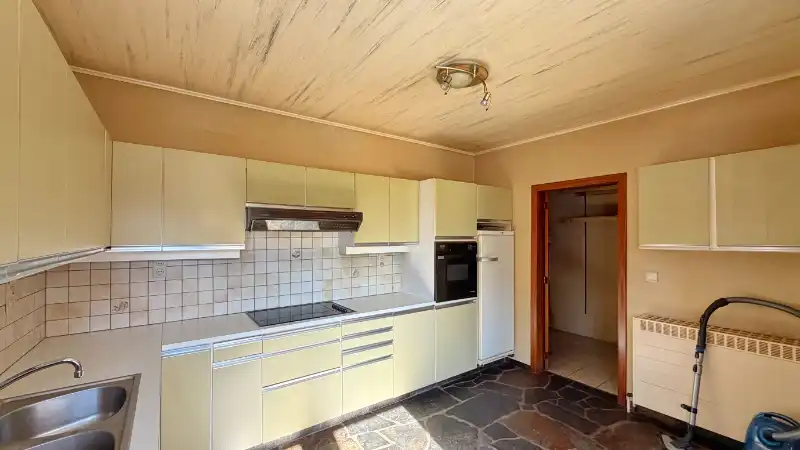 Woning van ±185m² op 4 are 60 ca in half-open-bebouwing foto 8