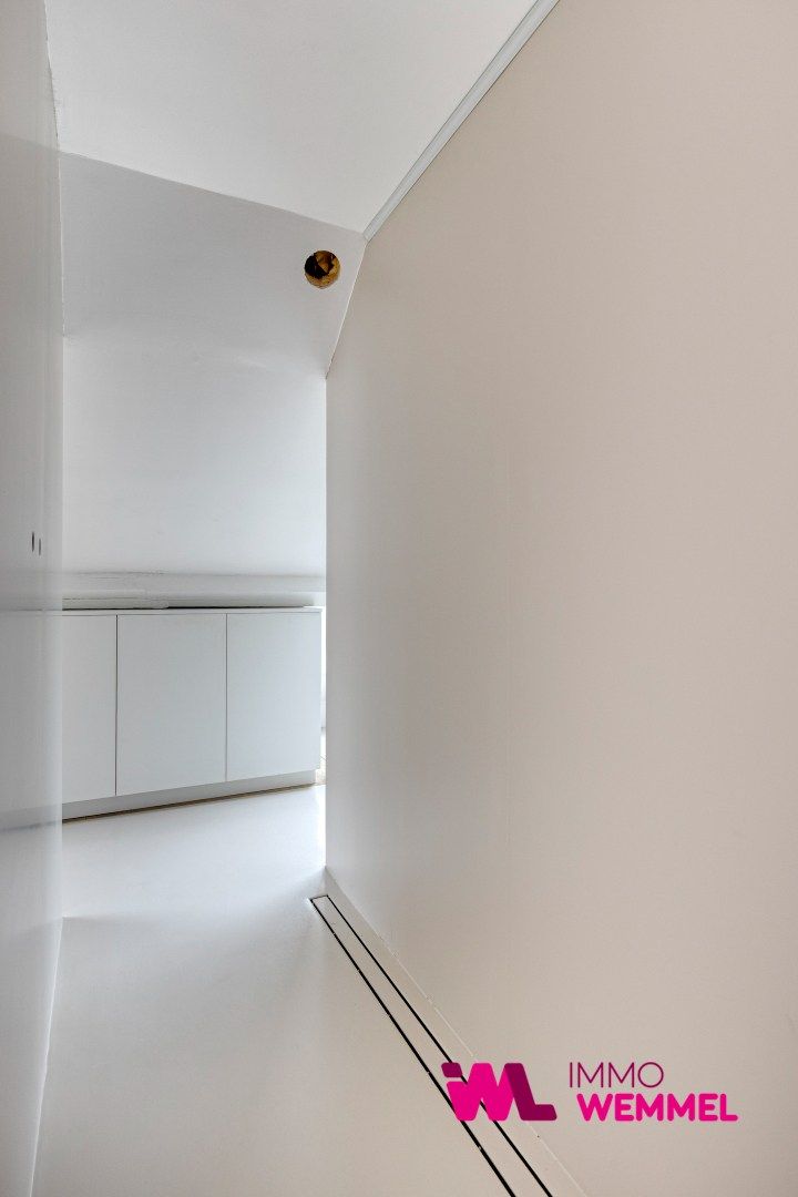 Instapklare gekoppelde woning in het centrum van Wemmel  foto 17