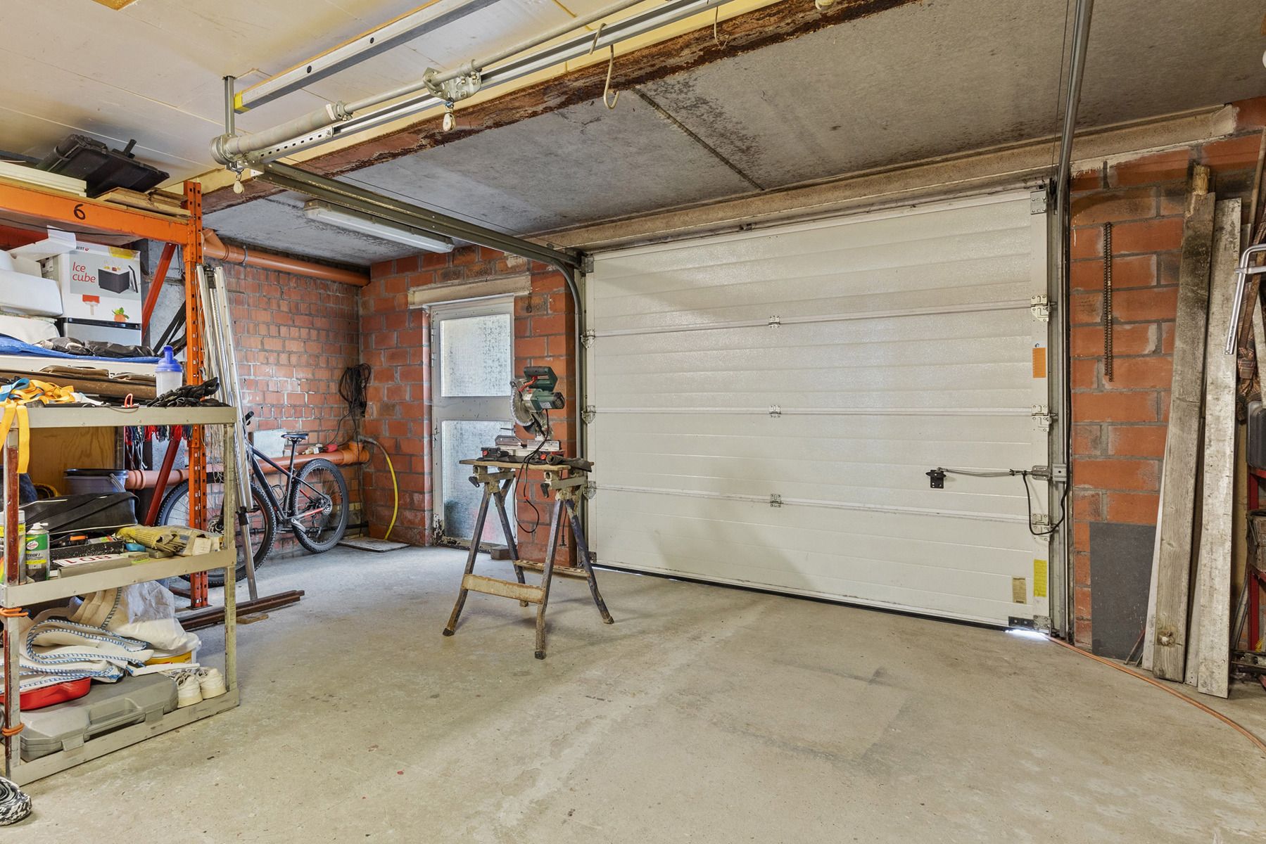 Charmante halfopen woning met ruime tuin, garage en duurzaam watergebruik! foto 24