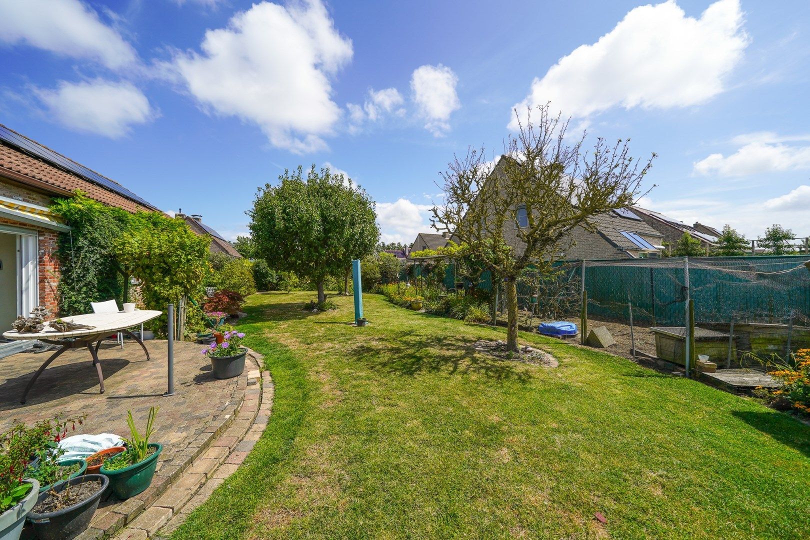 Ruime woning in Oudenburg met zongerichte tuin foto 4