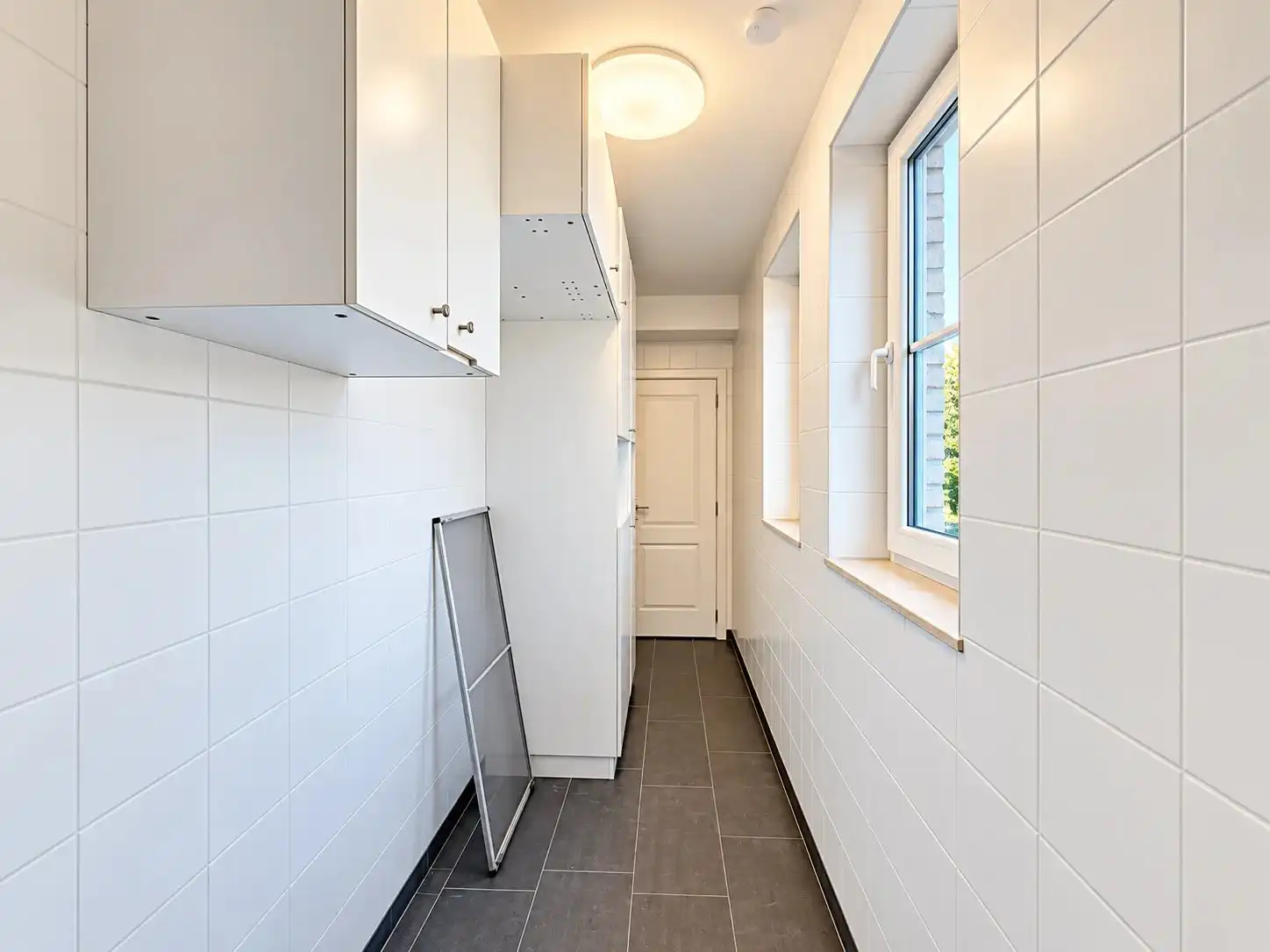 Zeer ruim duplex appartement met mogelijk 4 slaapkamers, ruim terras en garage vlakbij het centrum. foto 14