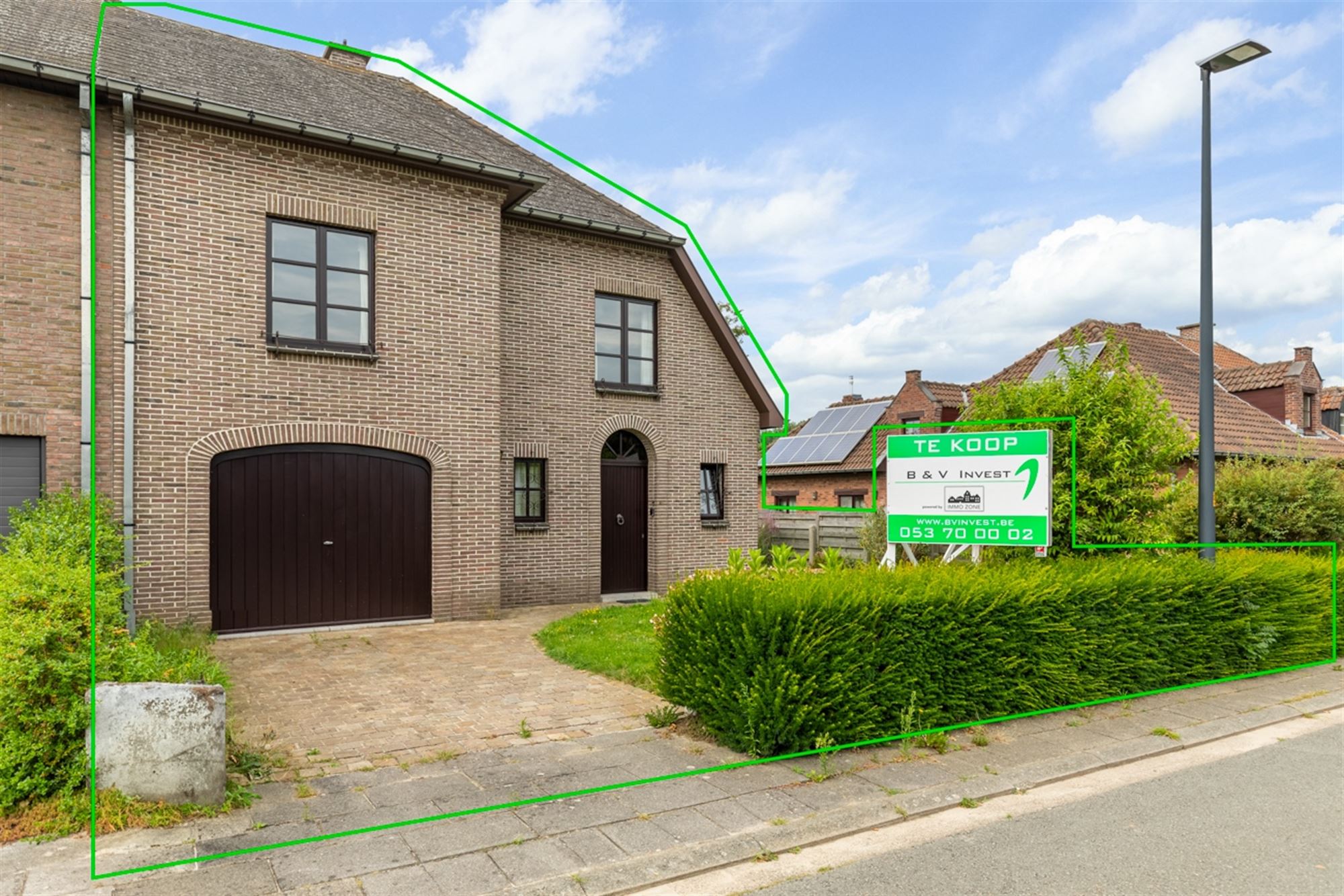 Rustig gelegen halfopen bebouwing met 4 slaapkamers en tuin! foto 1