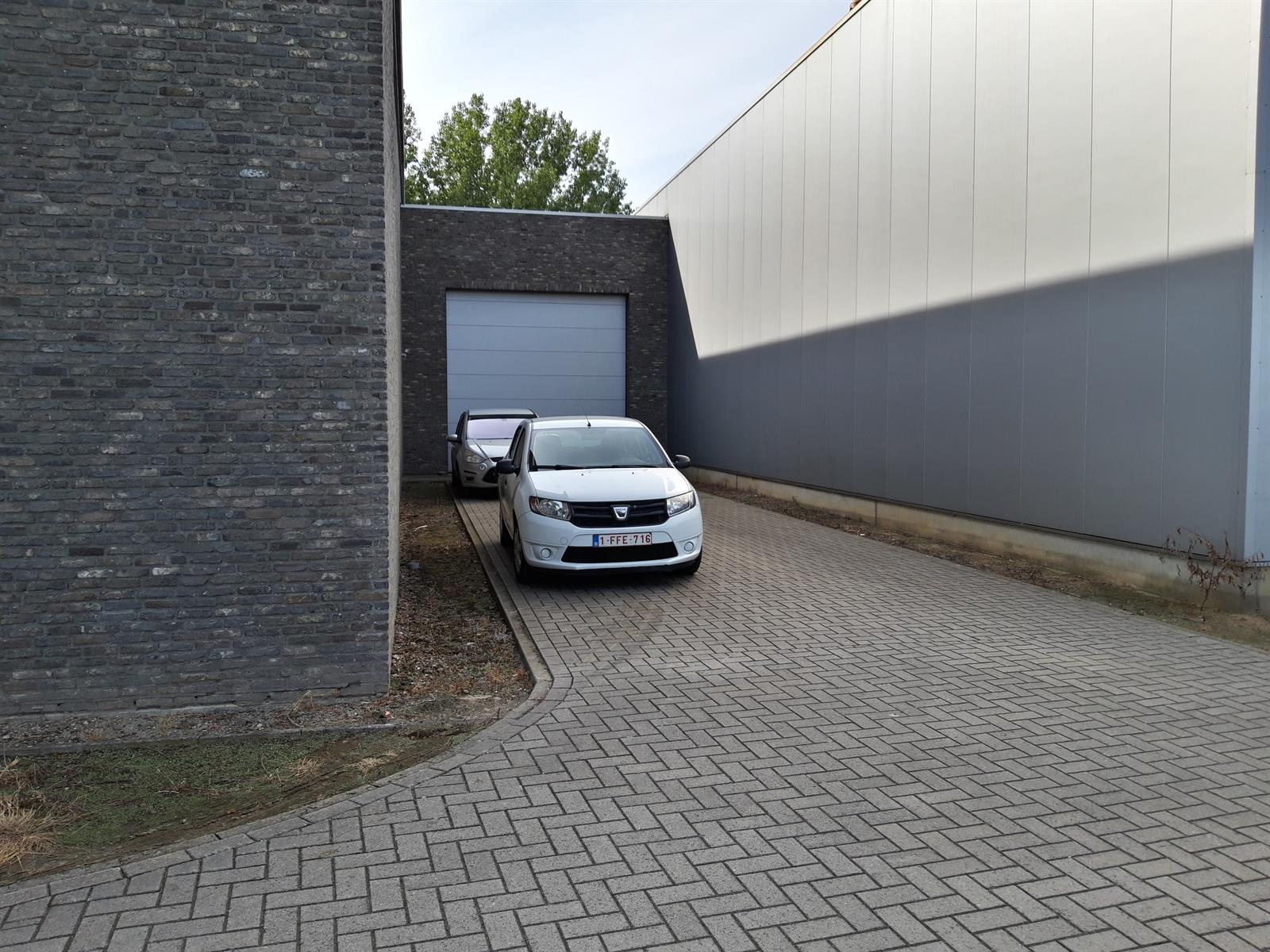 Magazijn, kantoren en toonzaal te huur in Aartselaar foto 48