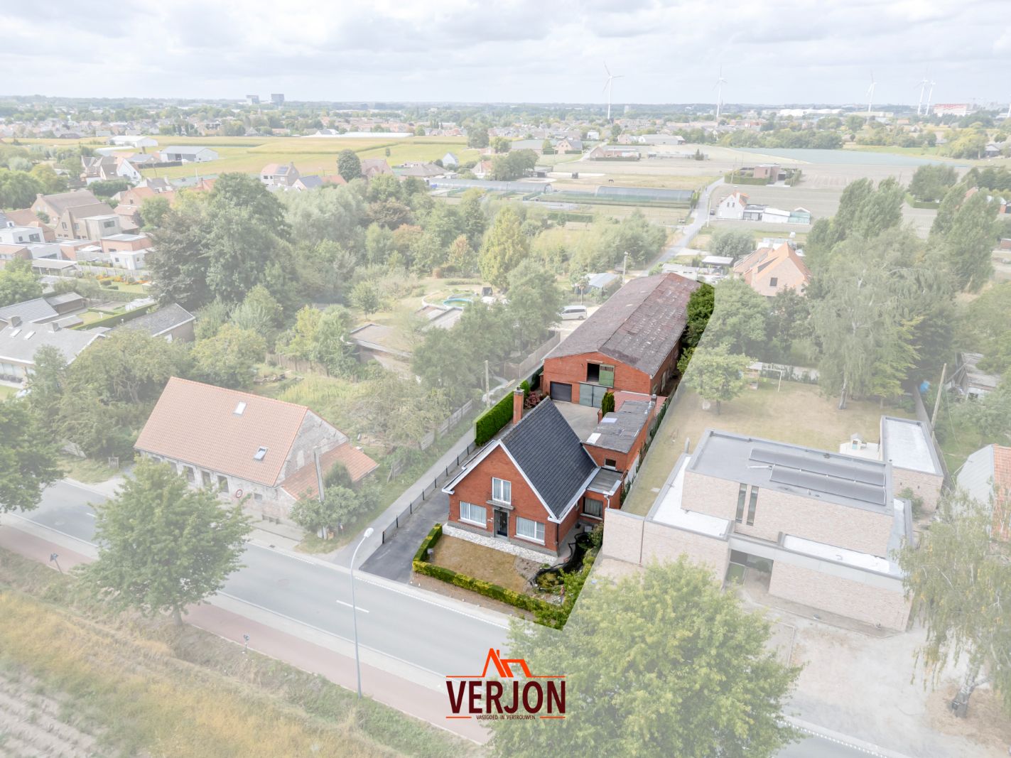 Alleenstaande woning met 440 m² opslagruimte in Kachtem! foto 2