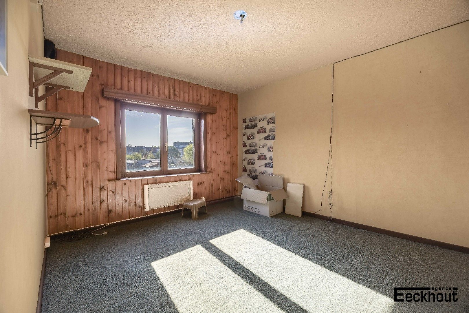 Te renoveren woning met diepe, zonnige tuin foto 6