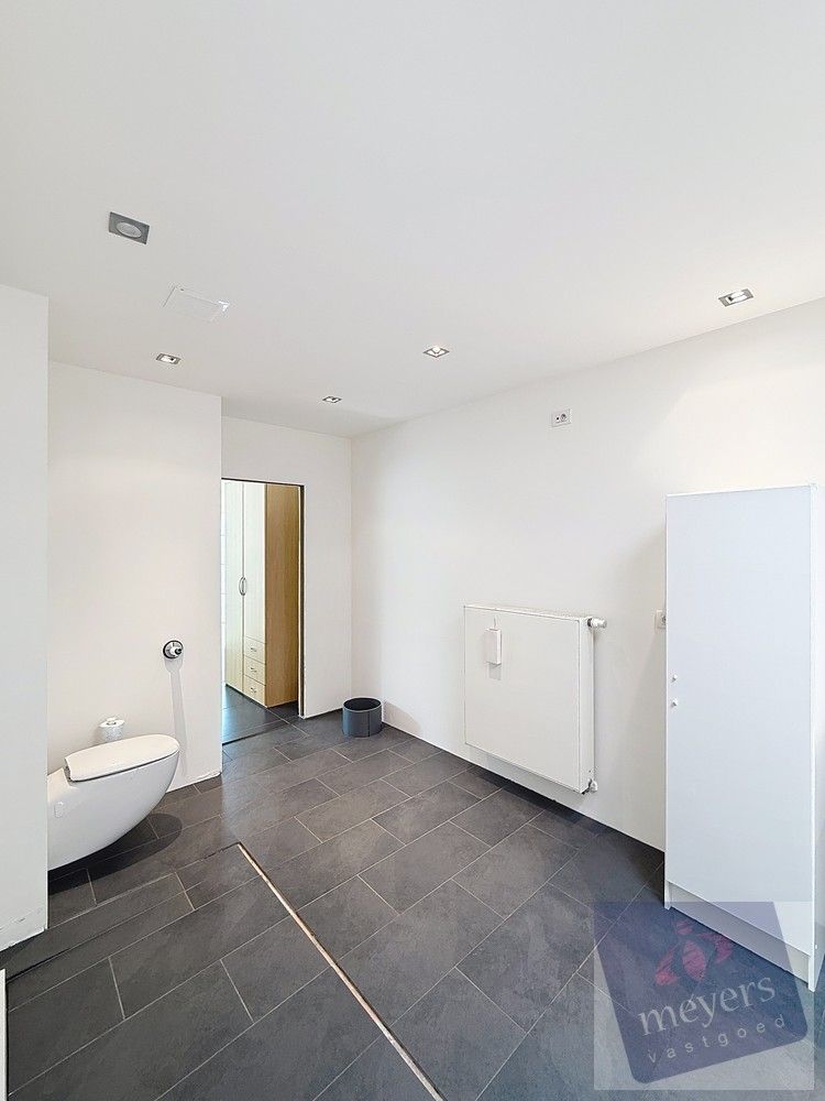 Handelspand met woonst op toplocatie in Spalbeek (Hasselt) foto 23