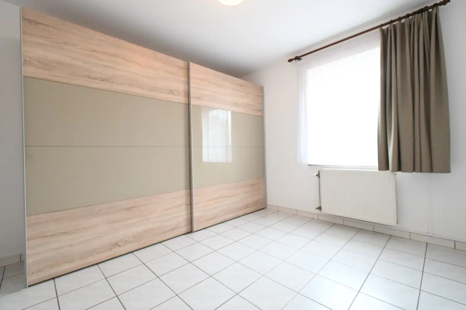 Gelijkvloers appartement met 2 slaapkamers en garage foto 13