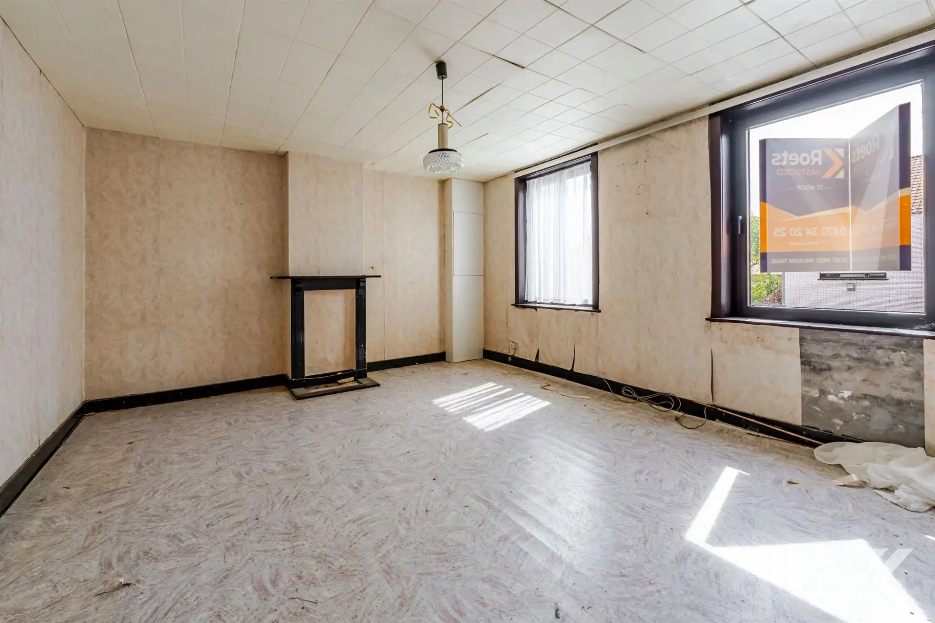 Te renoveren woning met veel potentieel en ruime zolder foto 13