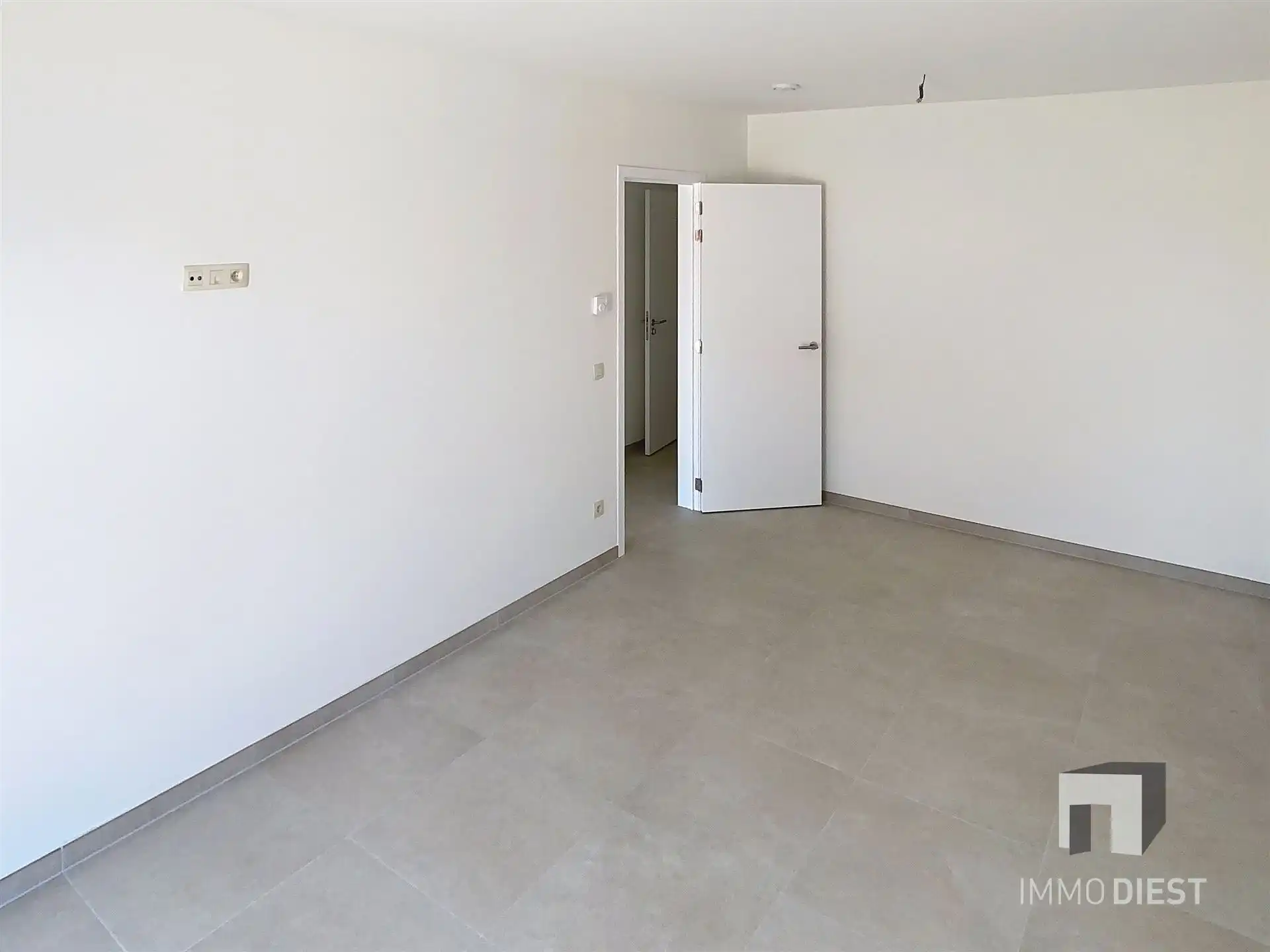 Gelijkvloers appartement met terras en tuintje foto 14