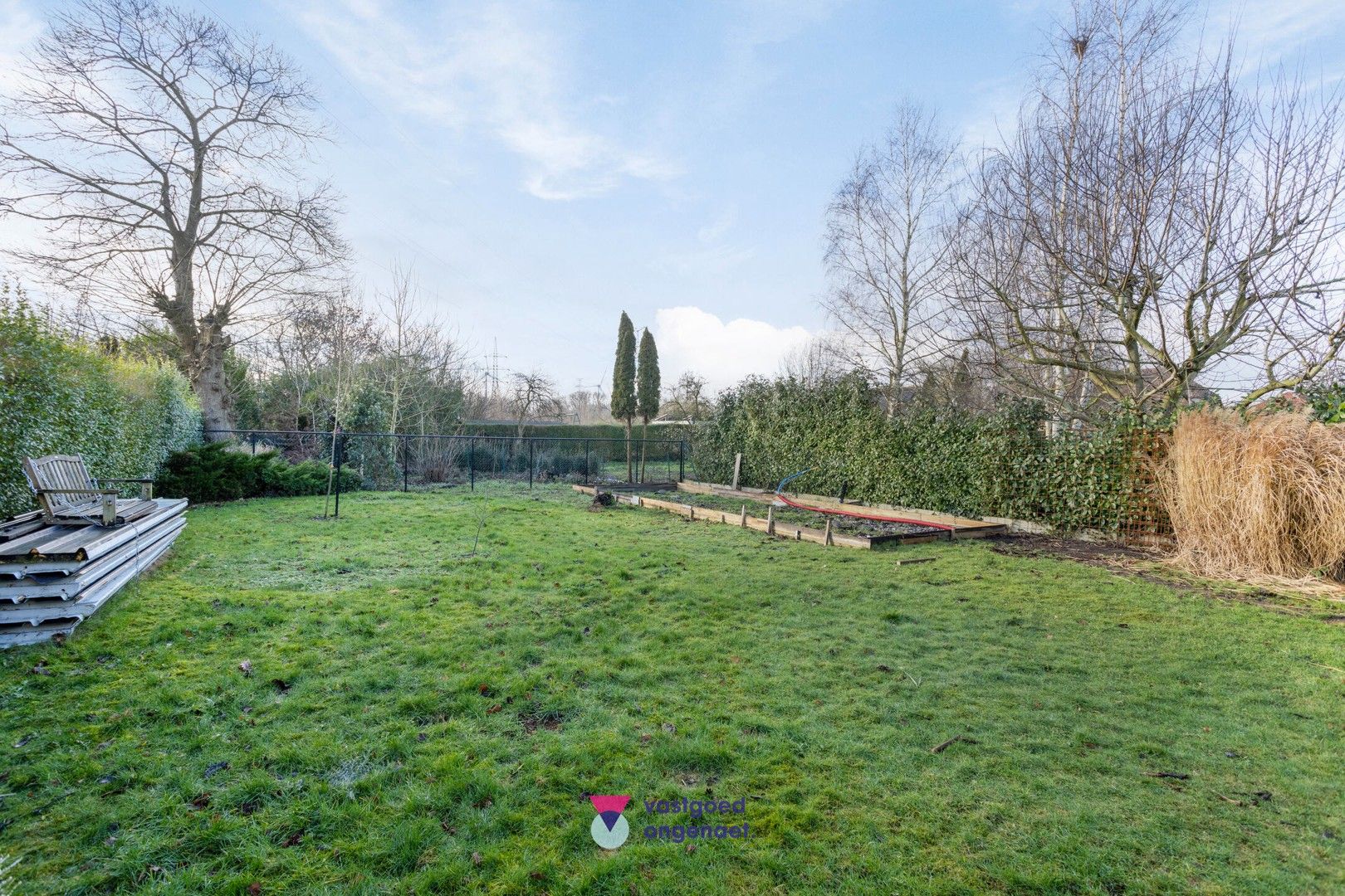 Ruime halfopen bebouwing met zonnige tuin foto 27