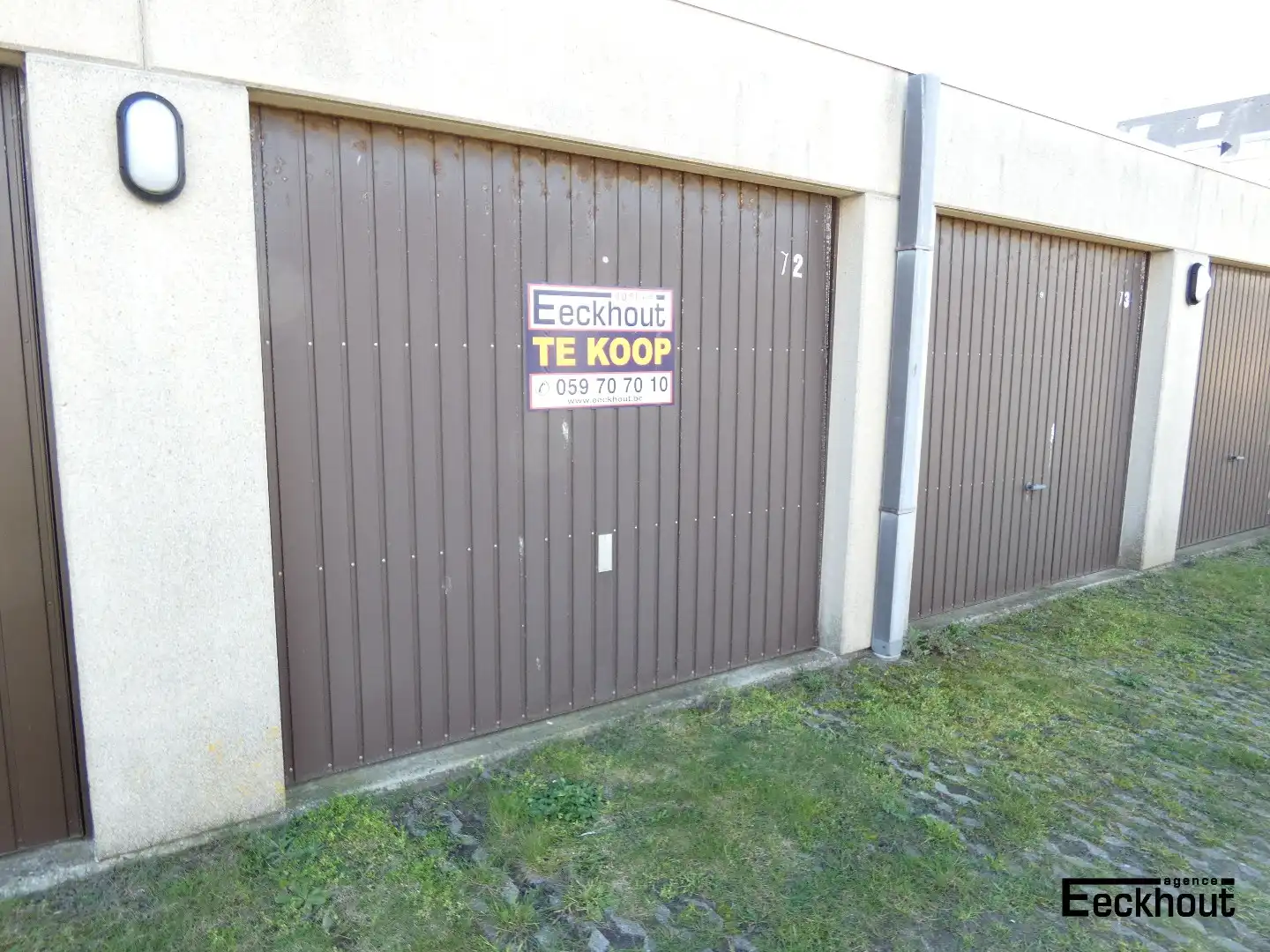 Garagebox met automatische poort dicht bij strand en duinen foto 4