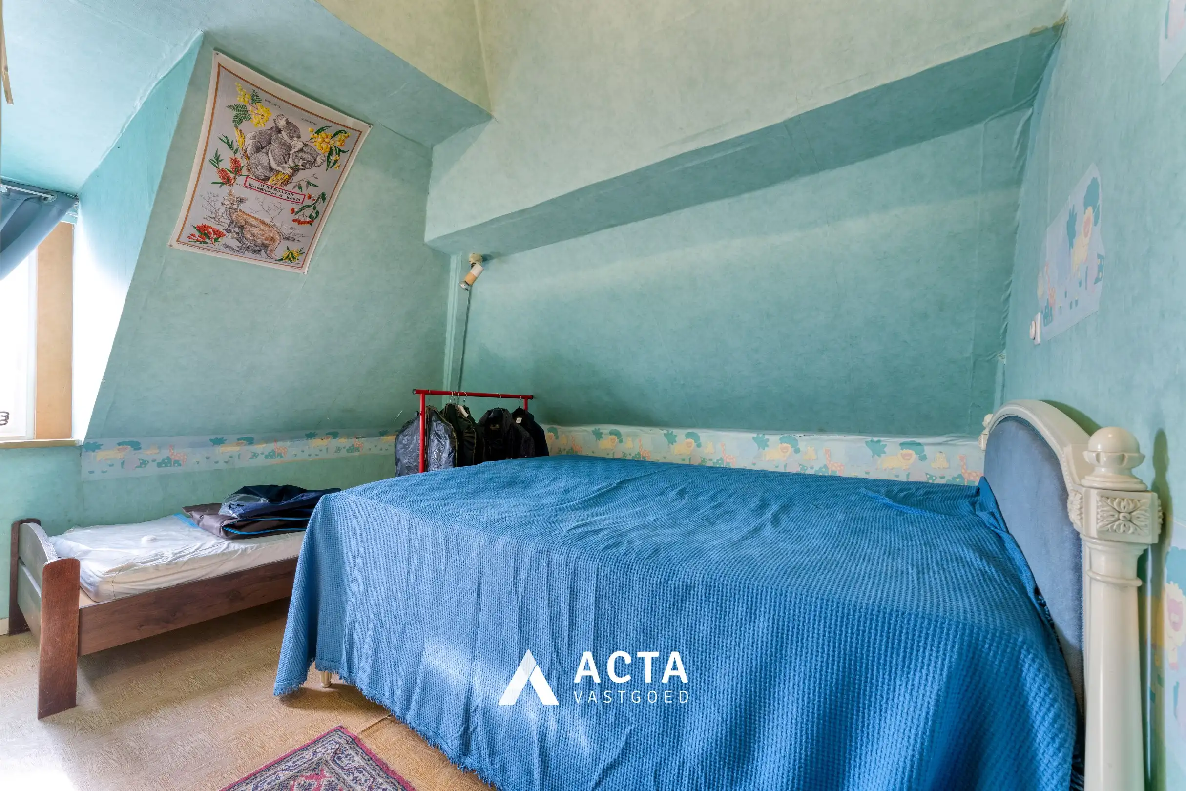 Halfopen bebouwing met vier slaapkamers en dubbele garage in Mariakerke foto 15