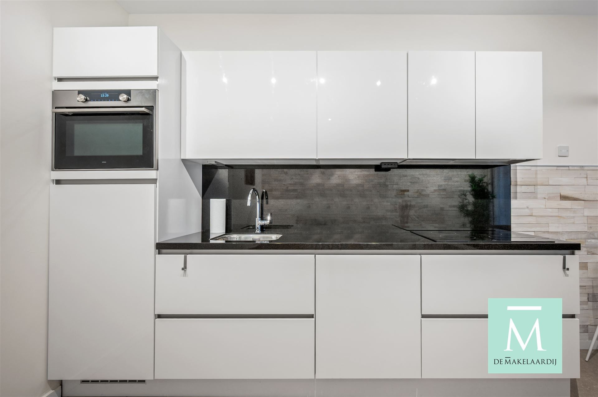 Charmante en energiezuinige gemeubelde studio op toplocatie in Mechelen! foto 4