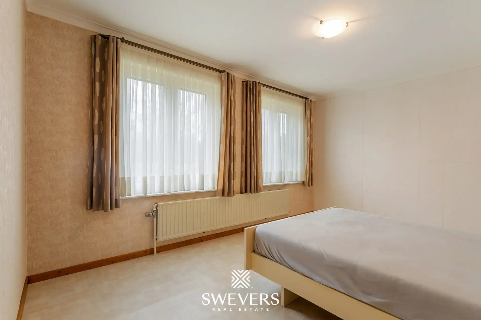 Open bebouwing met drie slaapkamers en uitzonderlijke kelder in Houthalen foto 16