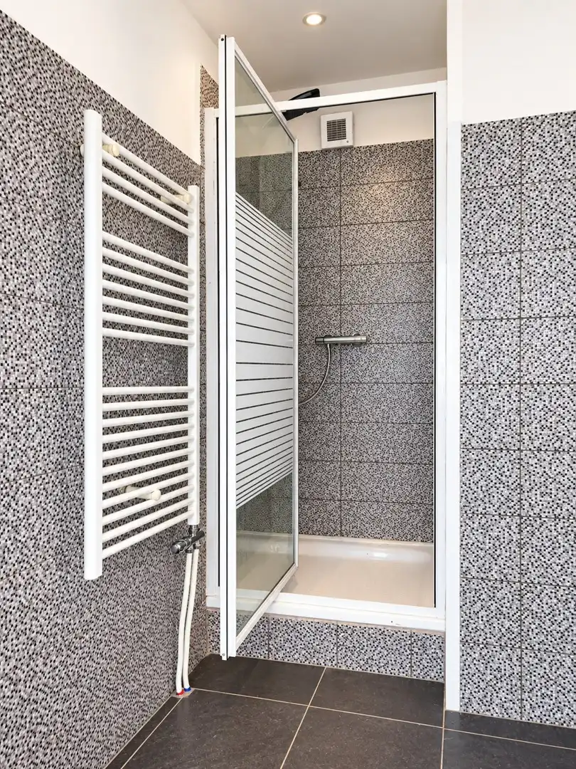 Halfopen bebouwing met 3 slaapkamers en zonnig tuintje in rustige dorpskern. foto 16