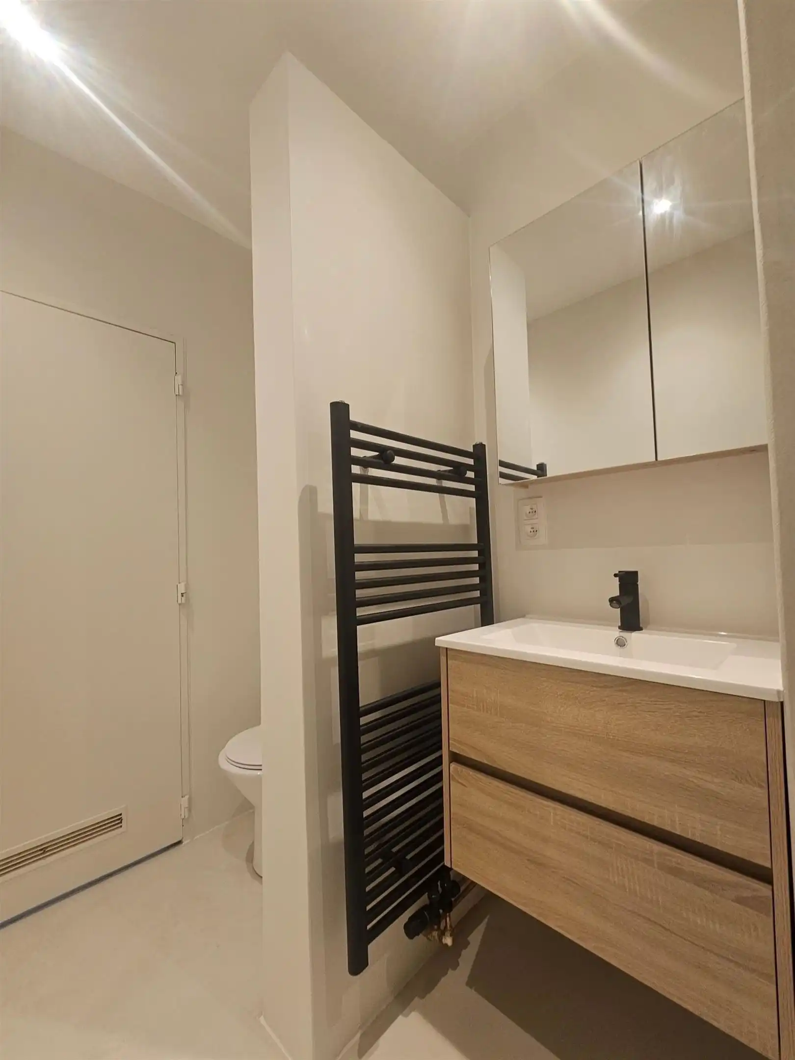 Instapklaar gelijkvloers appartement met stadstuintje! foto 8