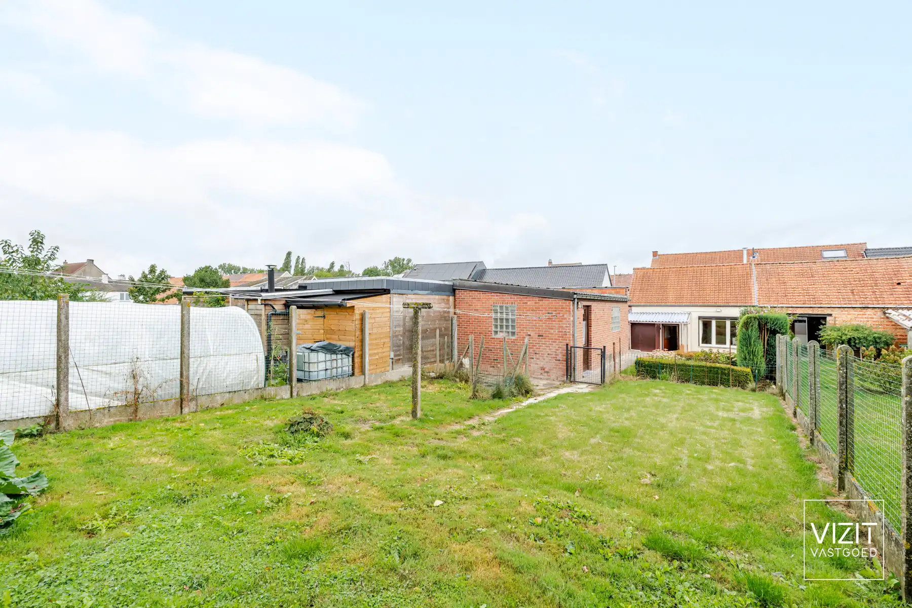 Halfopen woning met tuin en garage foto 29