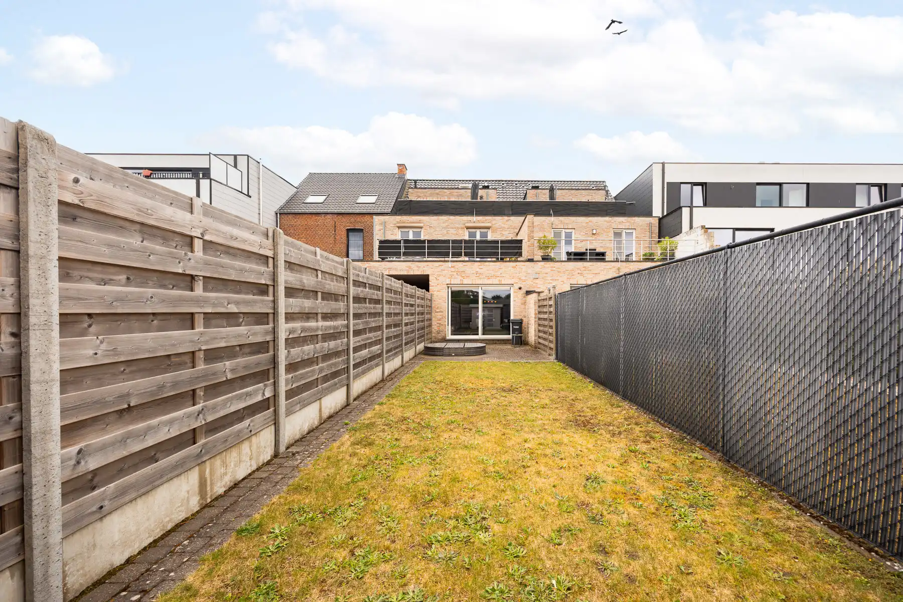 Instapklaar gelijkvloers appartement met tuin en carport foto 16