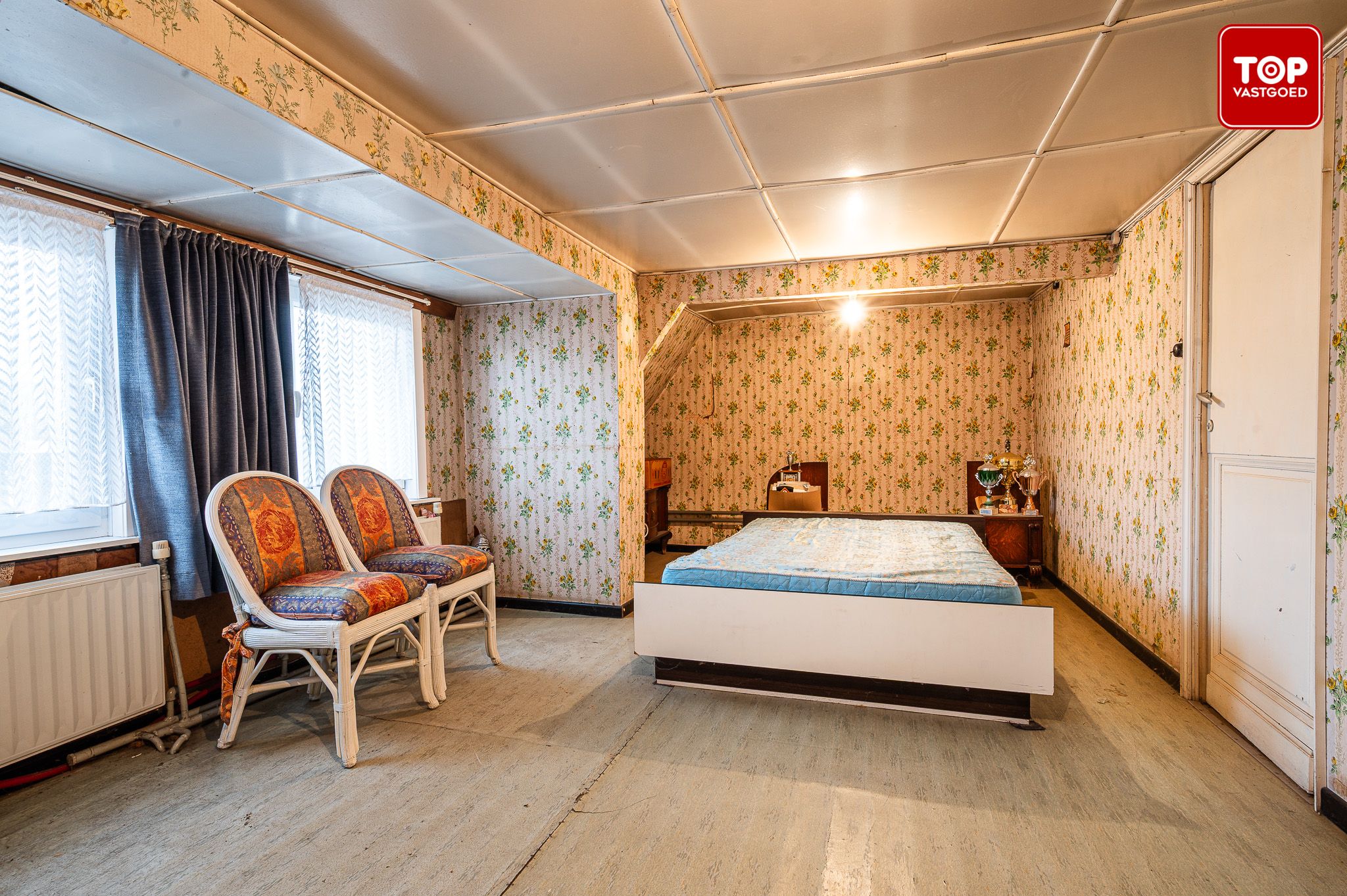 Totaal te renoveren woning met 4 slaapkamers en leuke tuin. foto 17