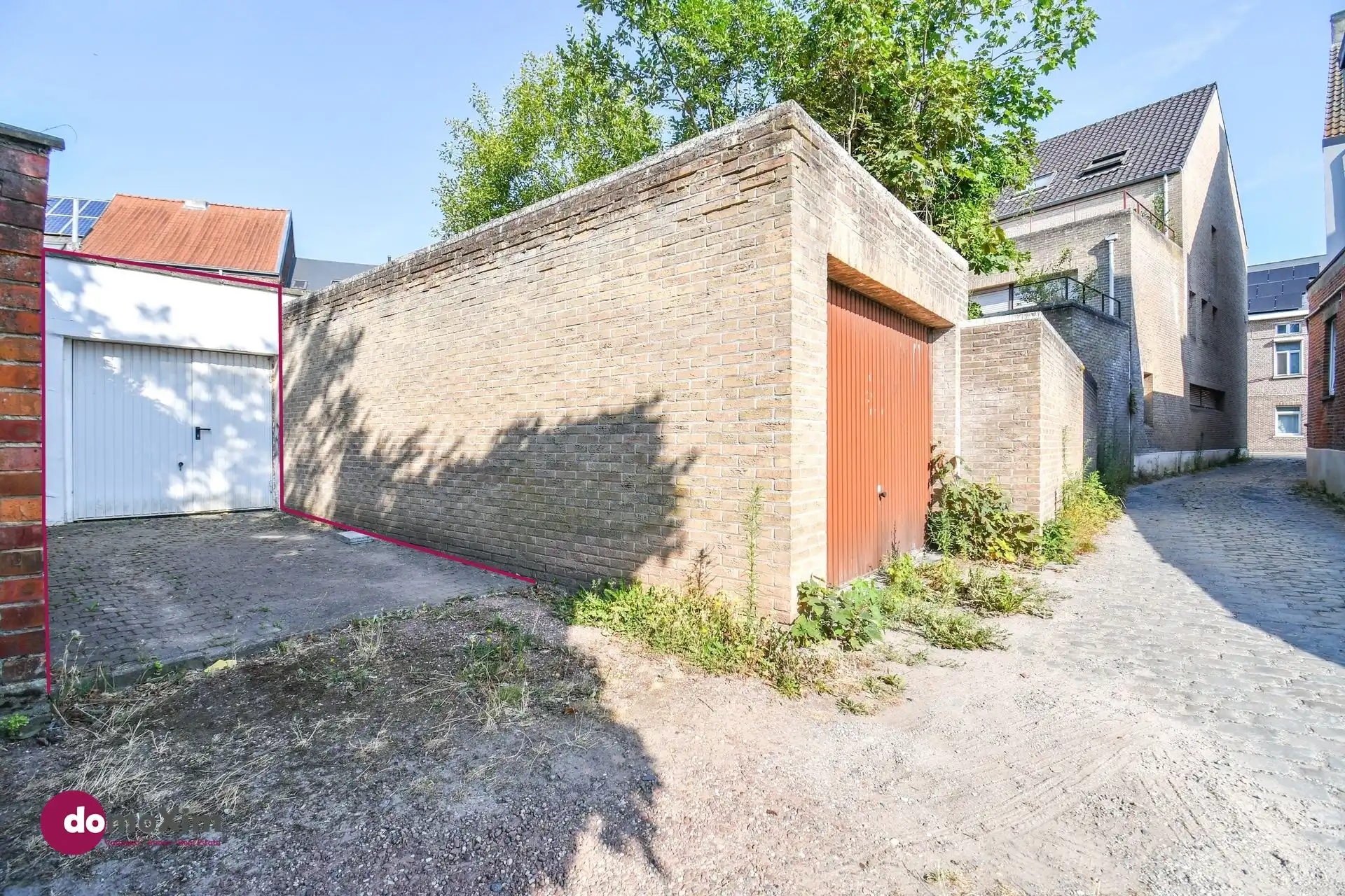 Te renoveren stadswoning met zuid-gerichte tuin en garage foto 16