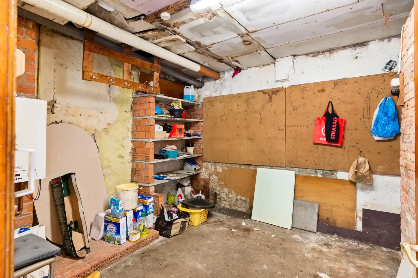 Te renoveren woning met 3 slpk., stadstuin en garage foto 12