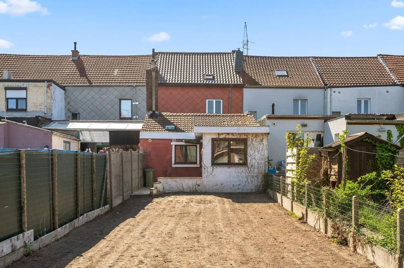 Op te frissen rijwoning op de Tiense stadsrand met tuin en 2 parkeerplaatsen foto 27