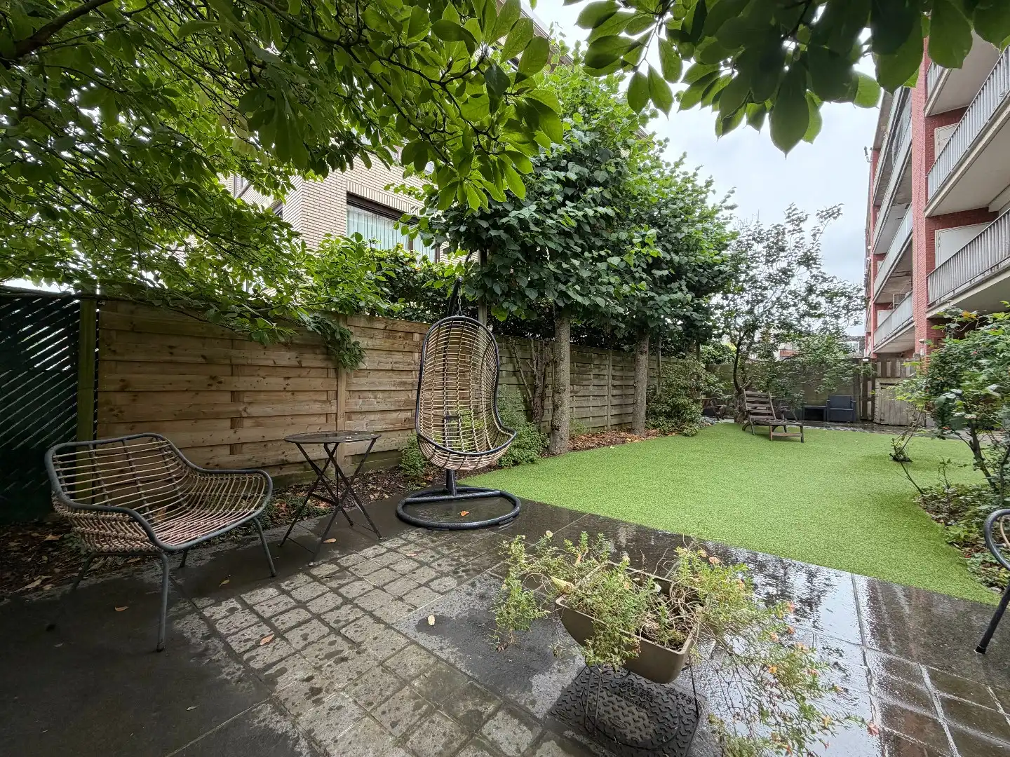 Gelijkvloers 2-slaapkamerappartement met privatieve tuin van ca. 100 m² aan Boekenbergpark foto {{pictureIndex}}