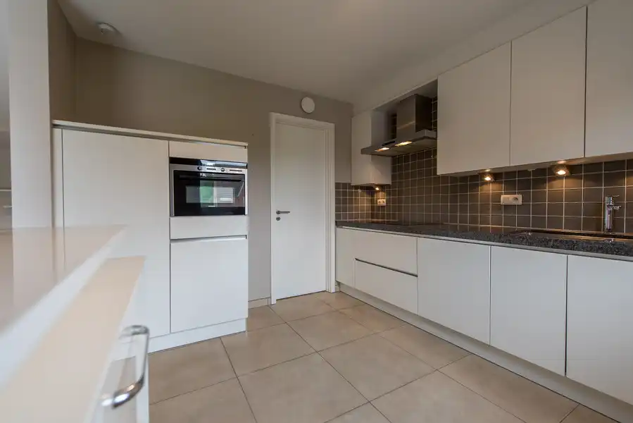 Instapklaar appartement van 107 m² in centrum Diepenbeek. foto 12