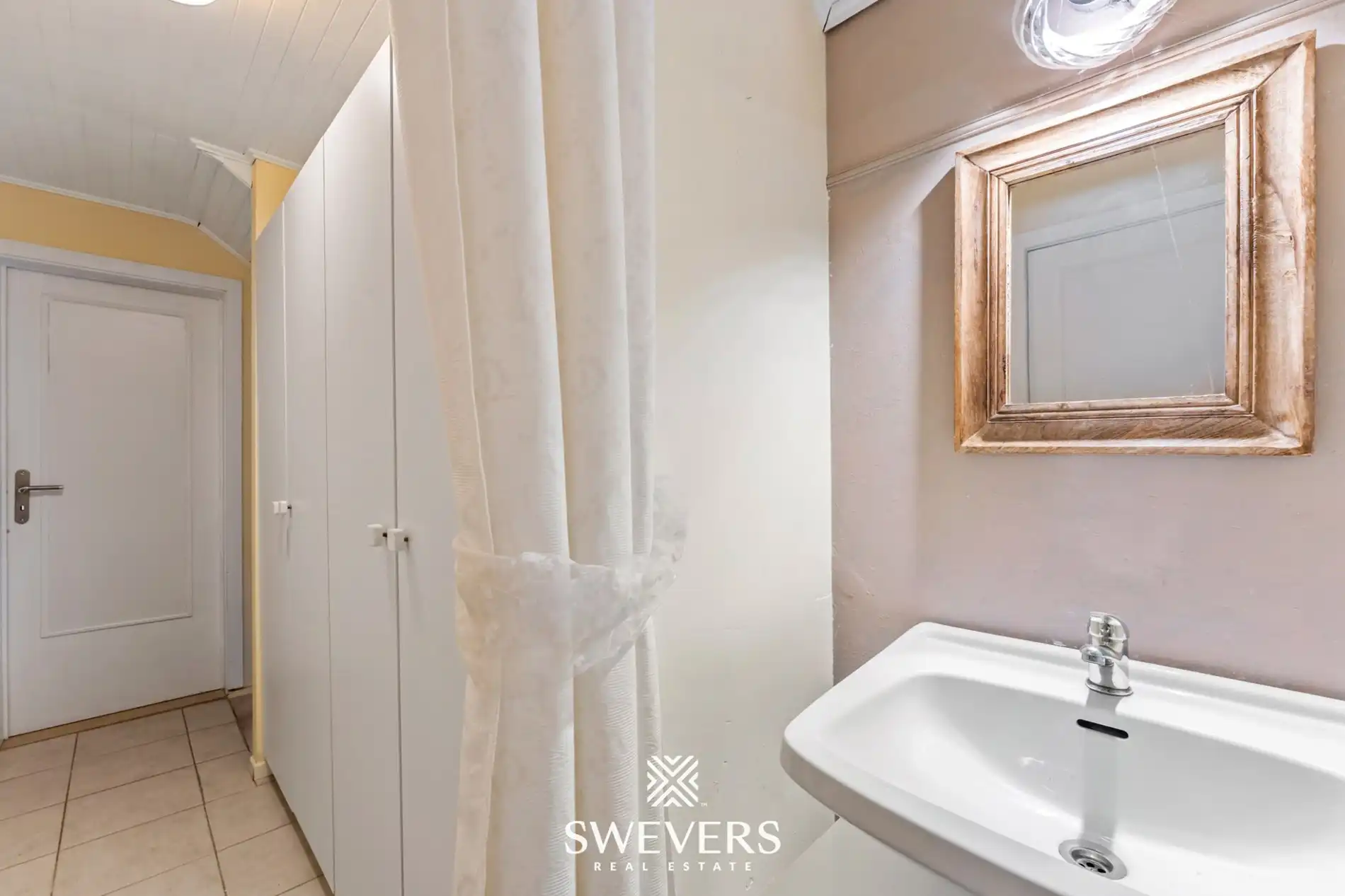 Instapklare open bebouwing met zuidgerichte tuin nabij het centrum van Heusden foto 20