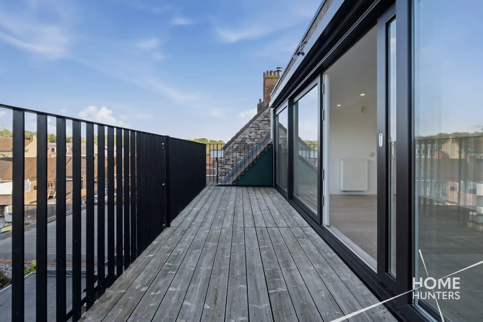 Ruim dakappartement met royaal terras en een schitterend uitzicht over Ieper foto 10